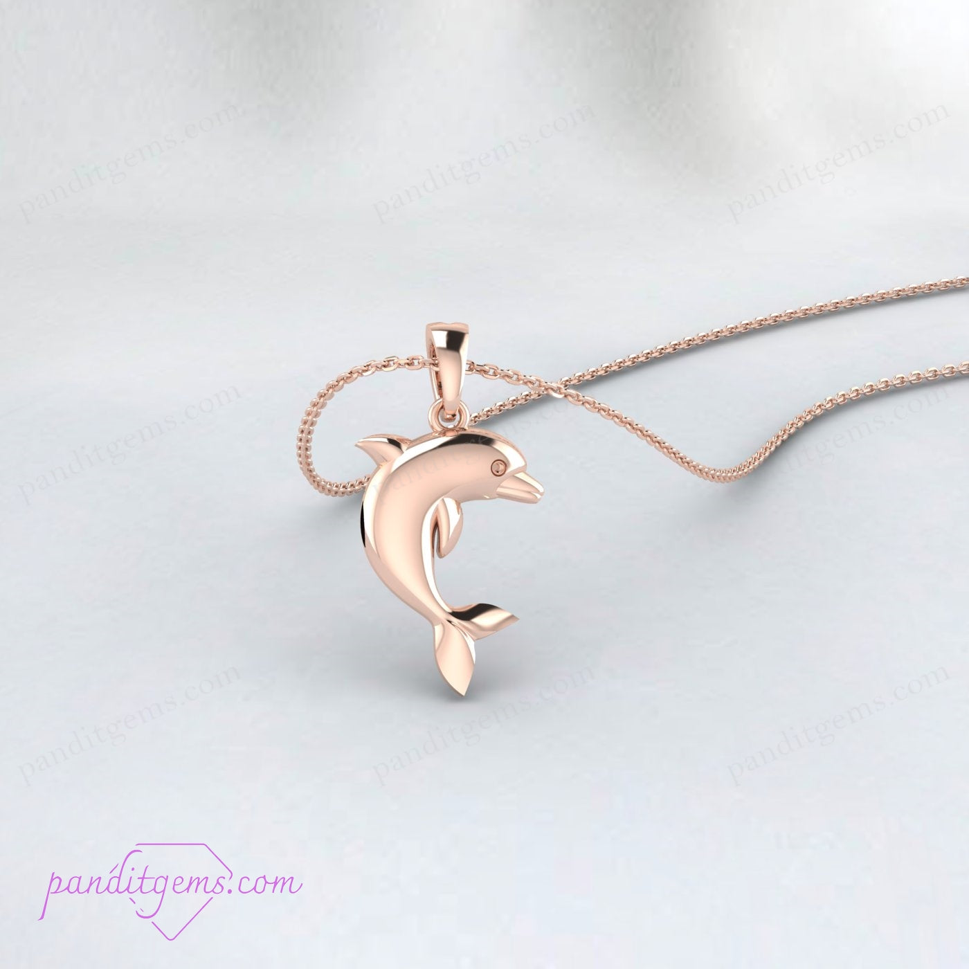 "14K gold dolphin necklace with marine life inspiration for women."