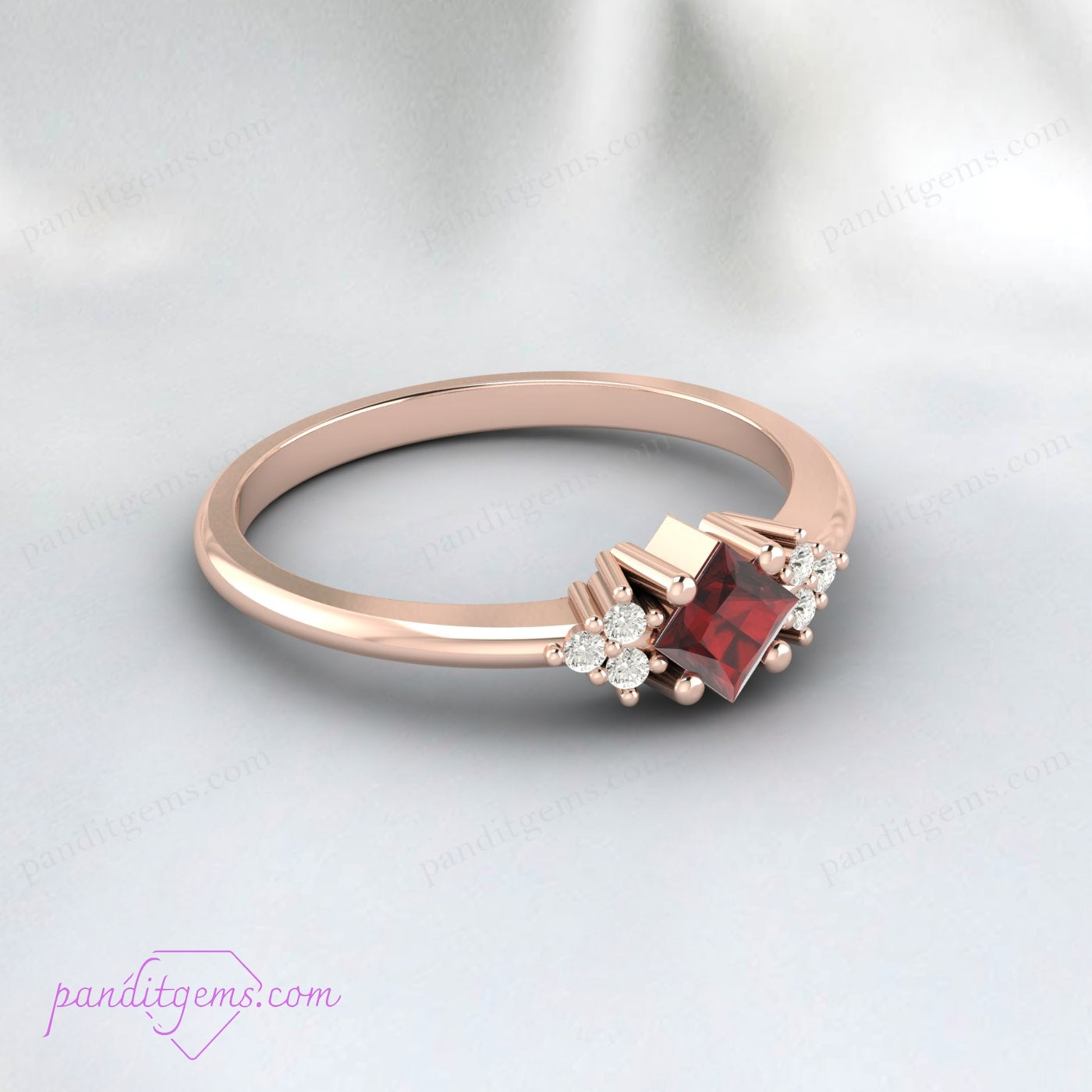 925 sterling silver garnet ring featuring a princess-cut stone with sparkling diamond accents.
