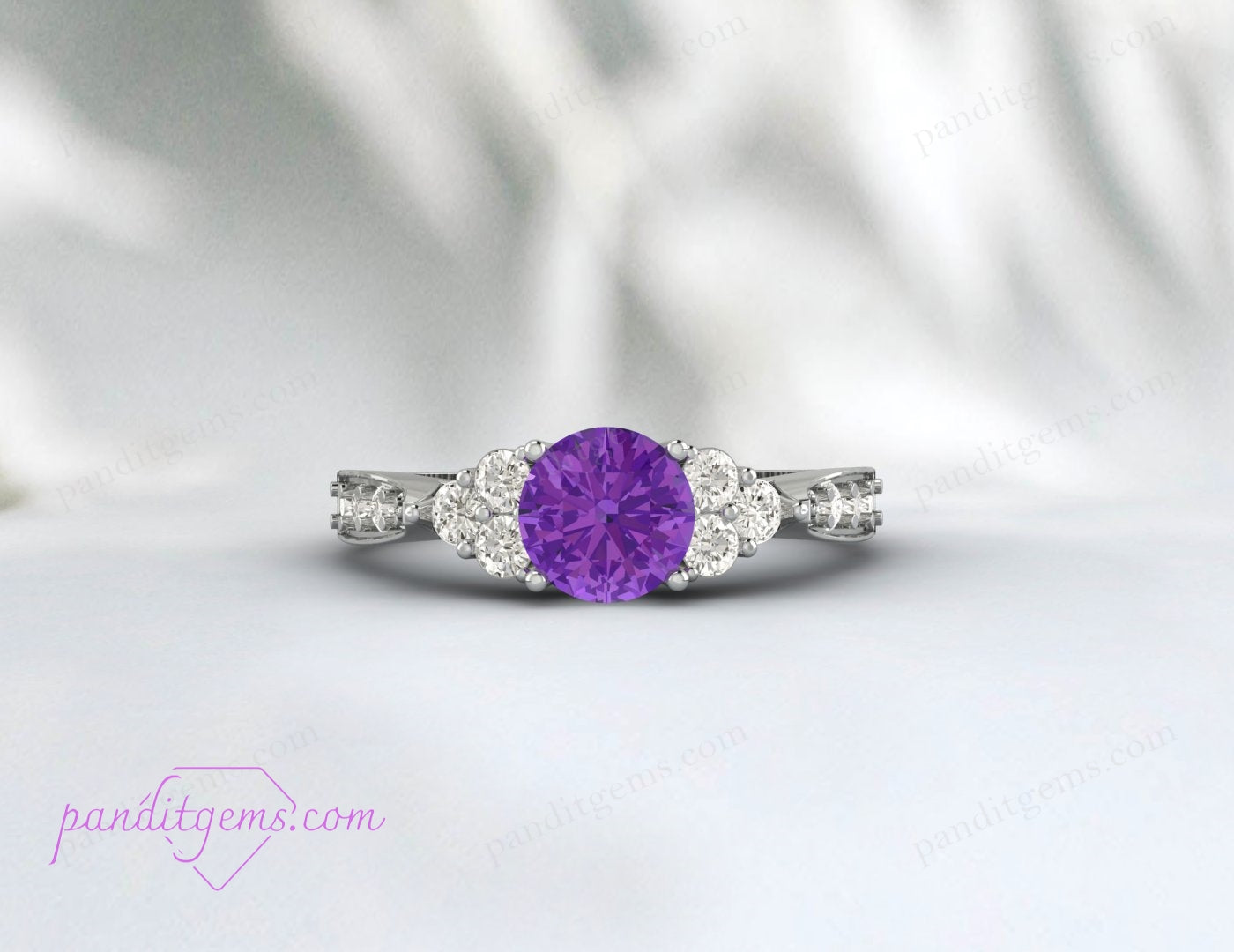 A close-up of a 14k rose gold filled Amethyst ring, featuring a radiant purple gemstone.