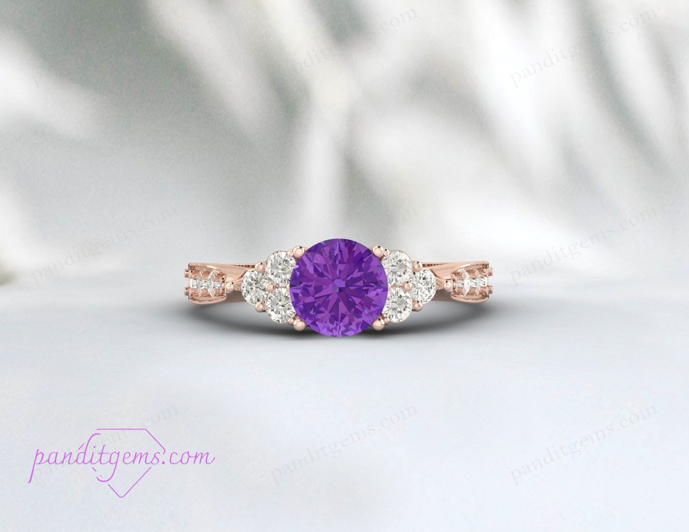 A minimalist rose gold and Amethyst engagement ring, ideal for weddings or anniversaries.