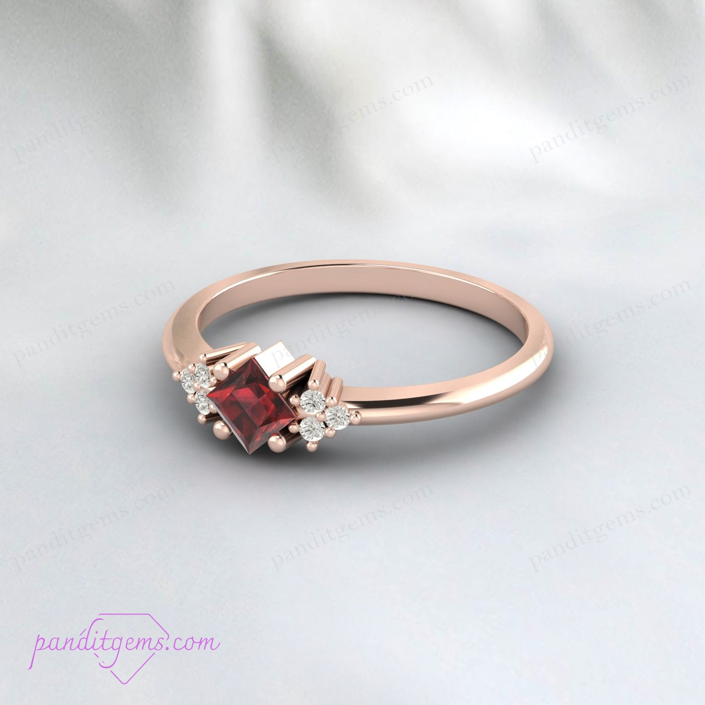 Beautiful vintage-inspired garnet ring with simulated diamond accents and a sterling silver band.