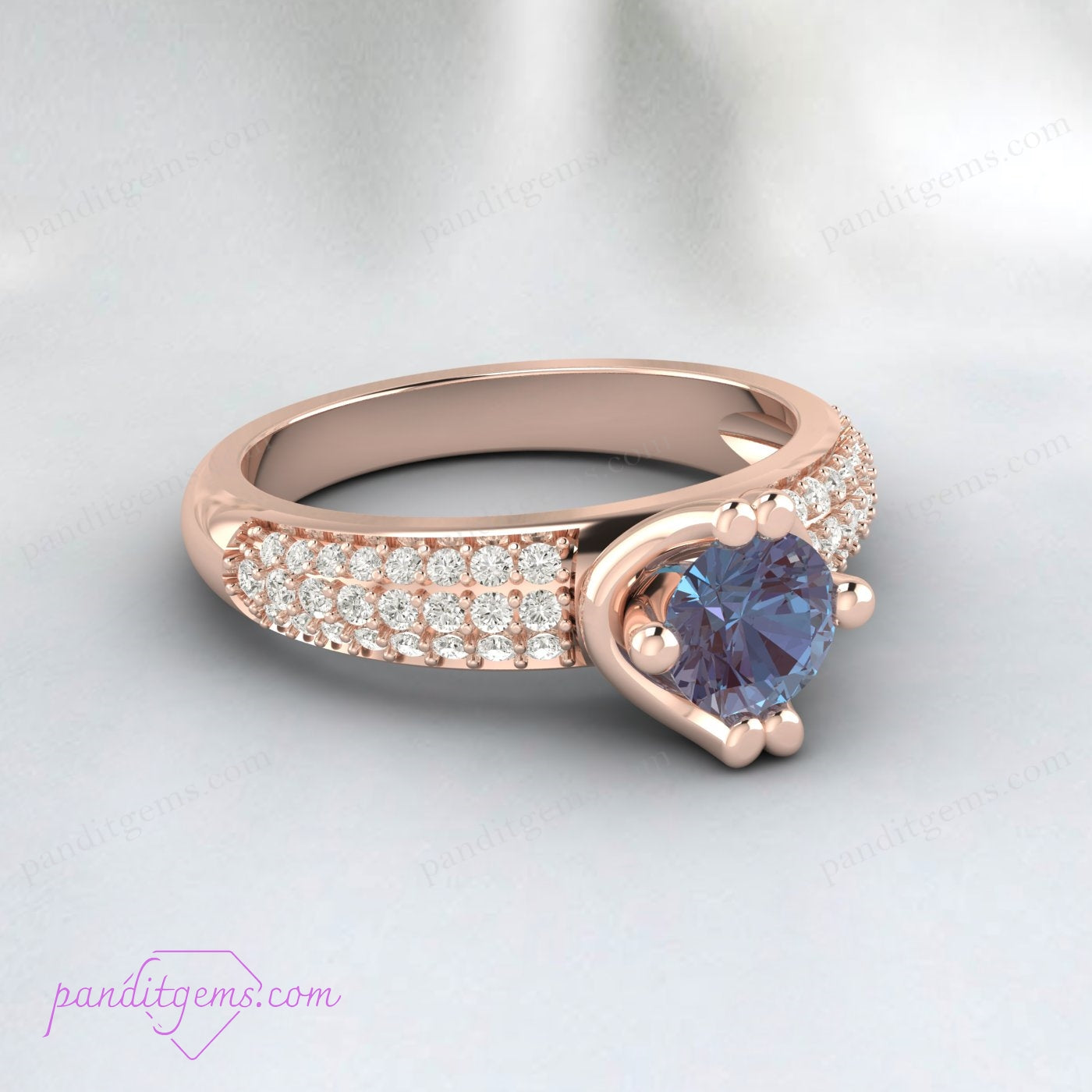 Close-up of a color-changing Alexandrite stone set in a 925 sterling silver ring.
