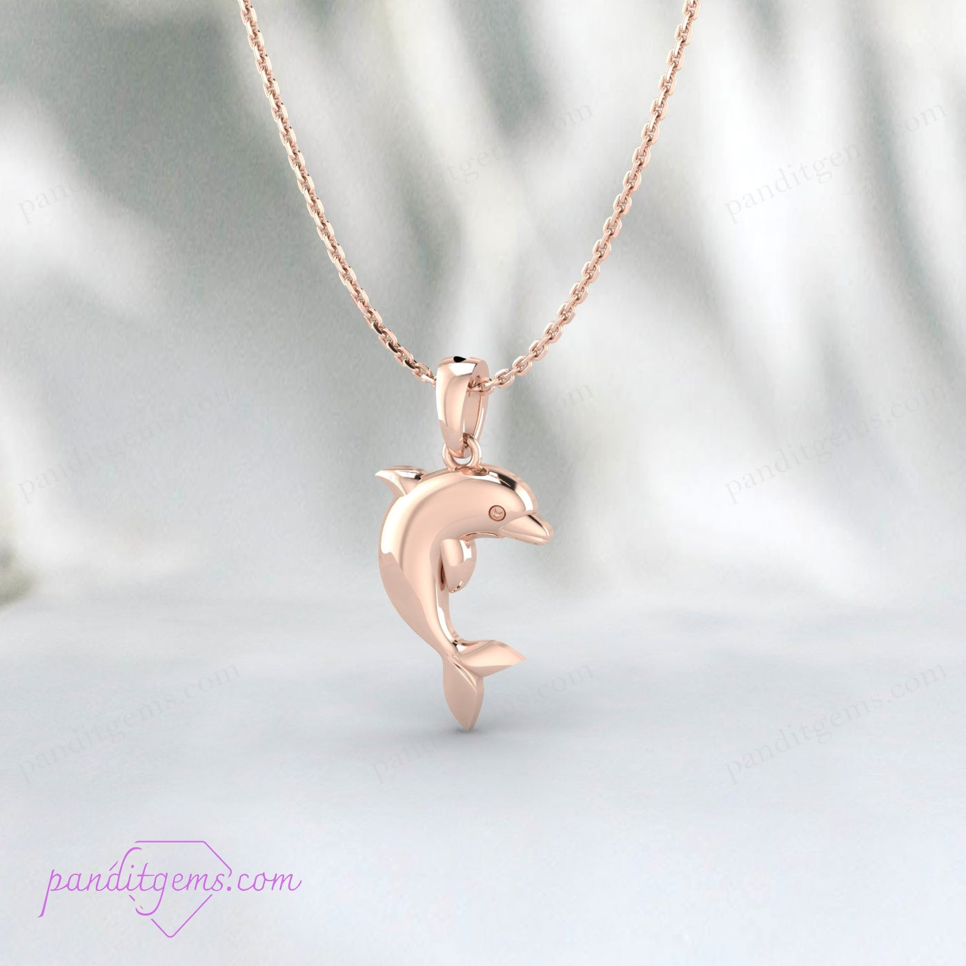 "Dainty dolphin pendant necklace crafted from high-quality sterling silver."