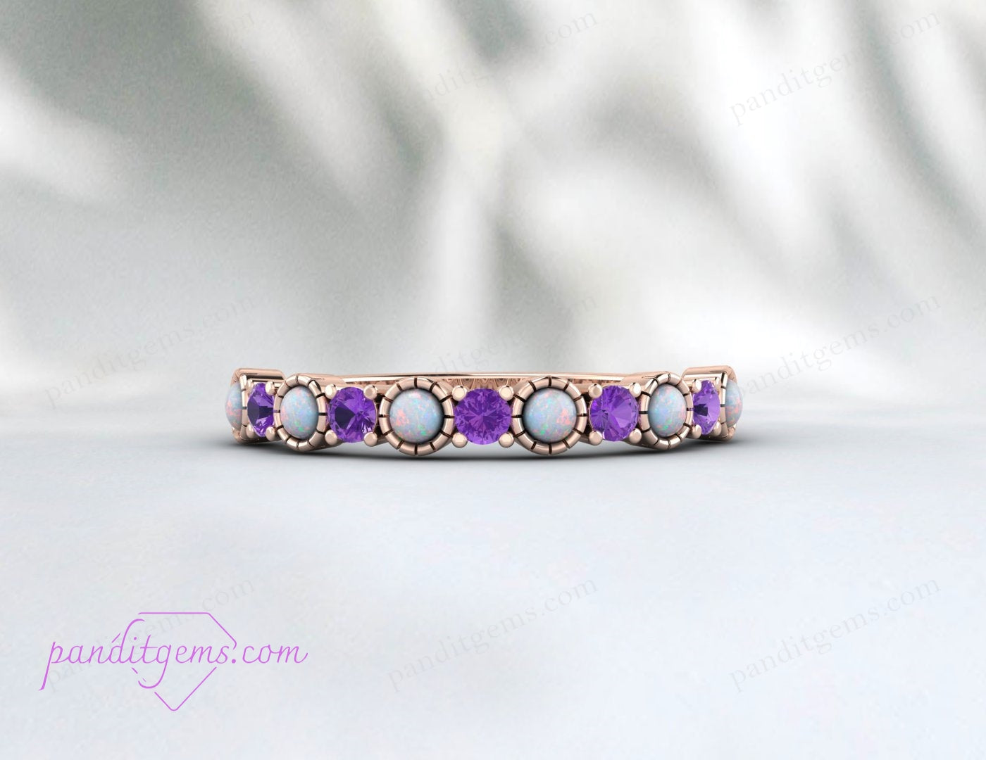 Delicate opal and amethyst wedding band in rose gold, designed for special occasions like weddings or anniversaries.