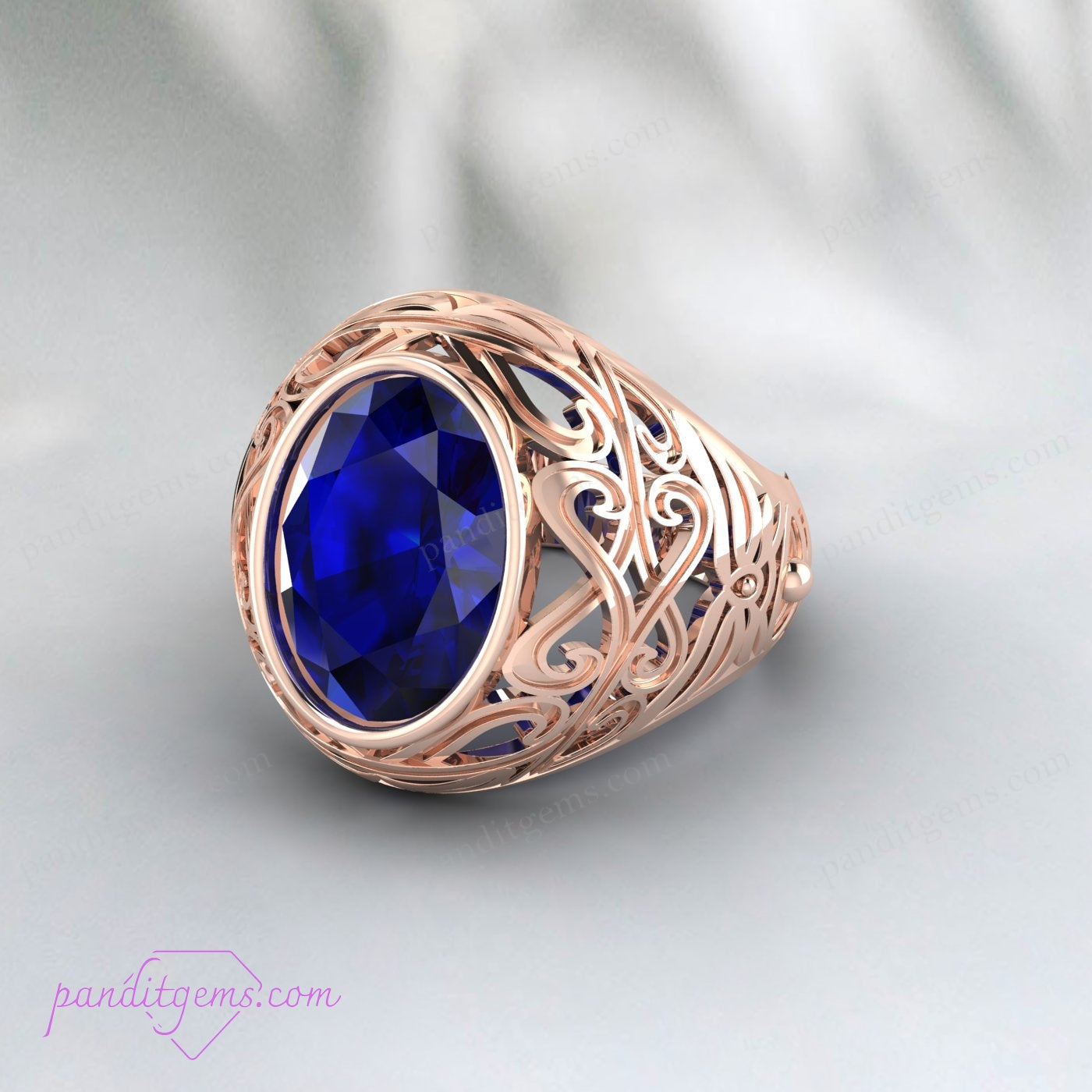 Elegant 925 Sterling Silver Vintage Blue Sapphire Ring, with a prominent oval cut sapphire and vintage filigree design.