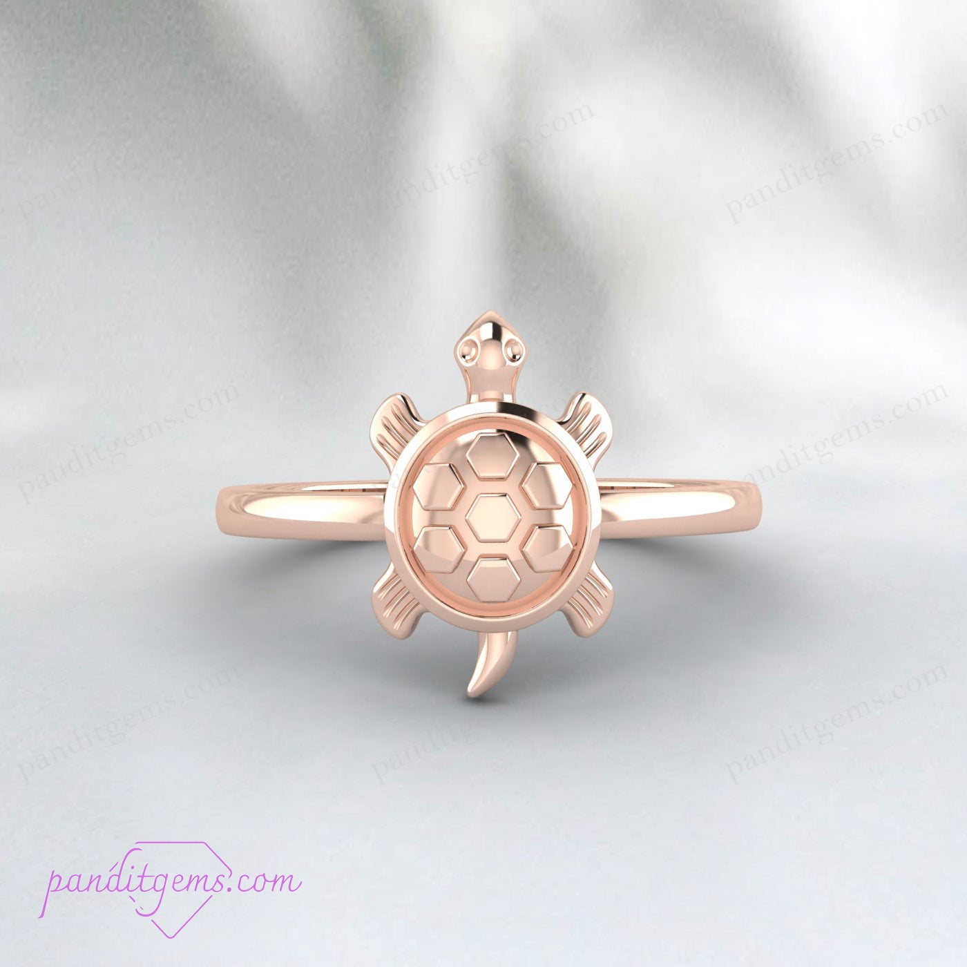 Handcrafted silver ring with a turtle design. The perfect gift for those seeking luck and prosperity in a minimalist style.