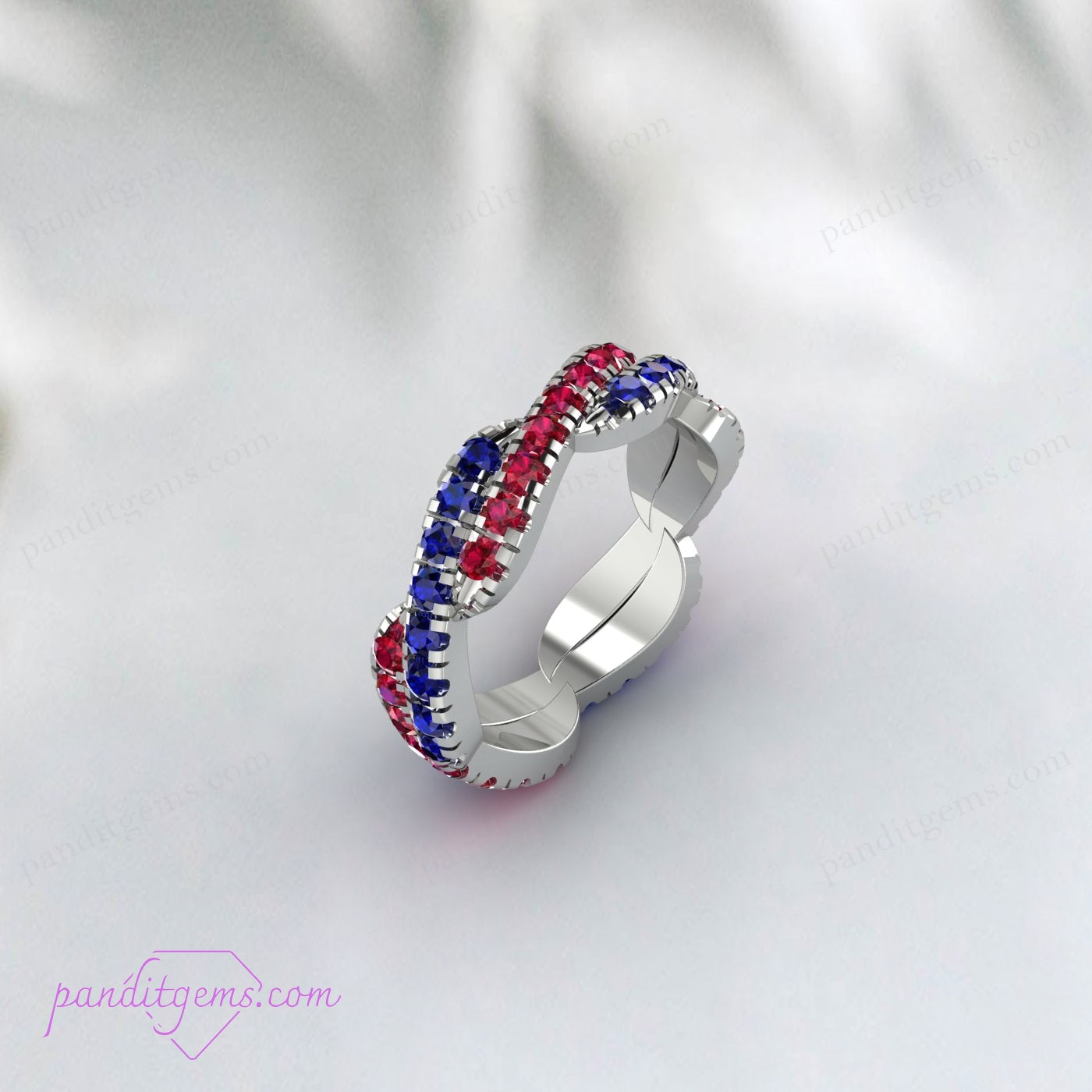Infinity twist wedding band featuring lab-grown Blue Sapphire and Ruby stones, ideal for wedding or anniversary gifts.