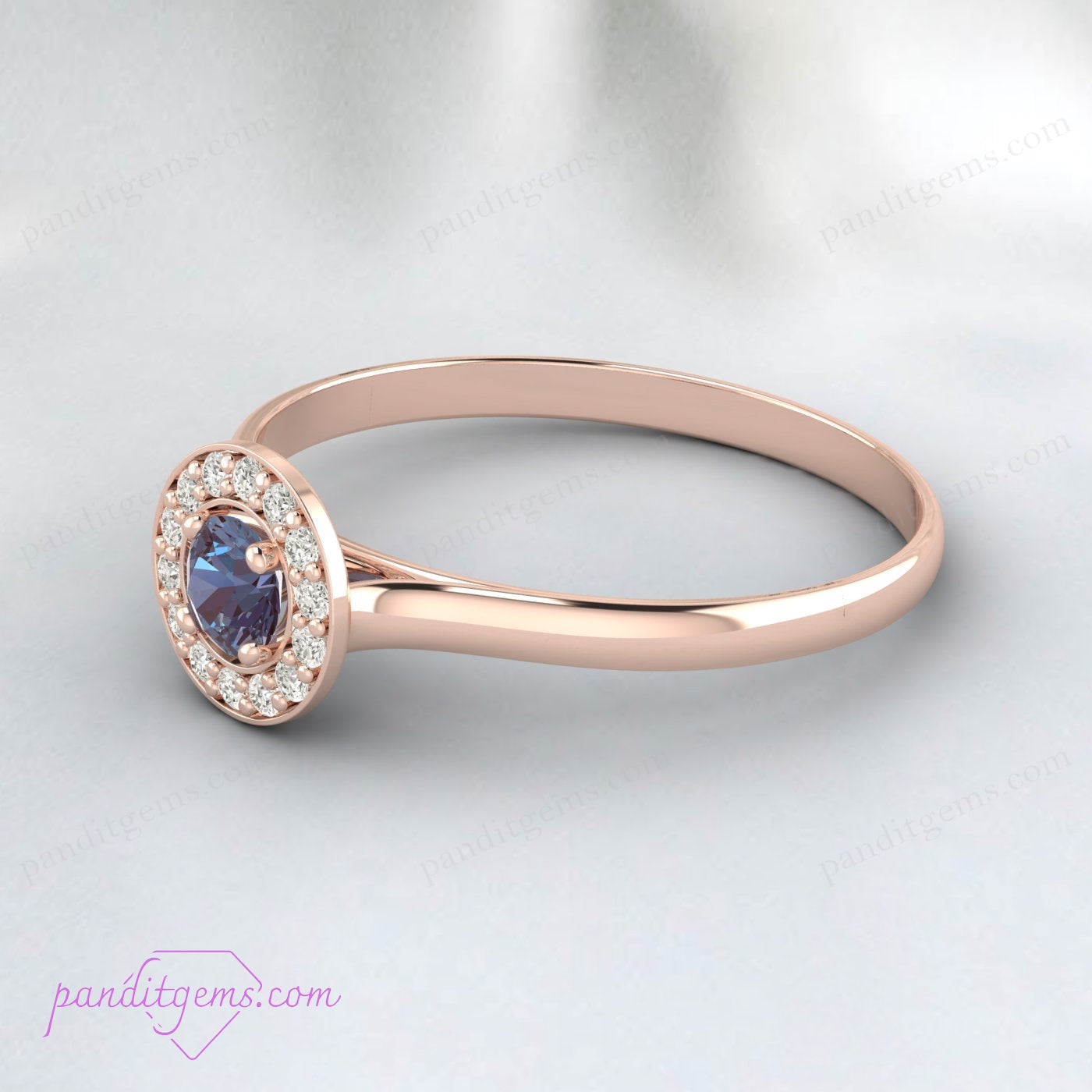 June birthstone ring with Alexandrite and simulated diamonds set in rose gold.