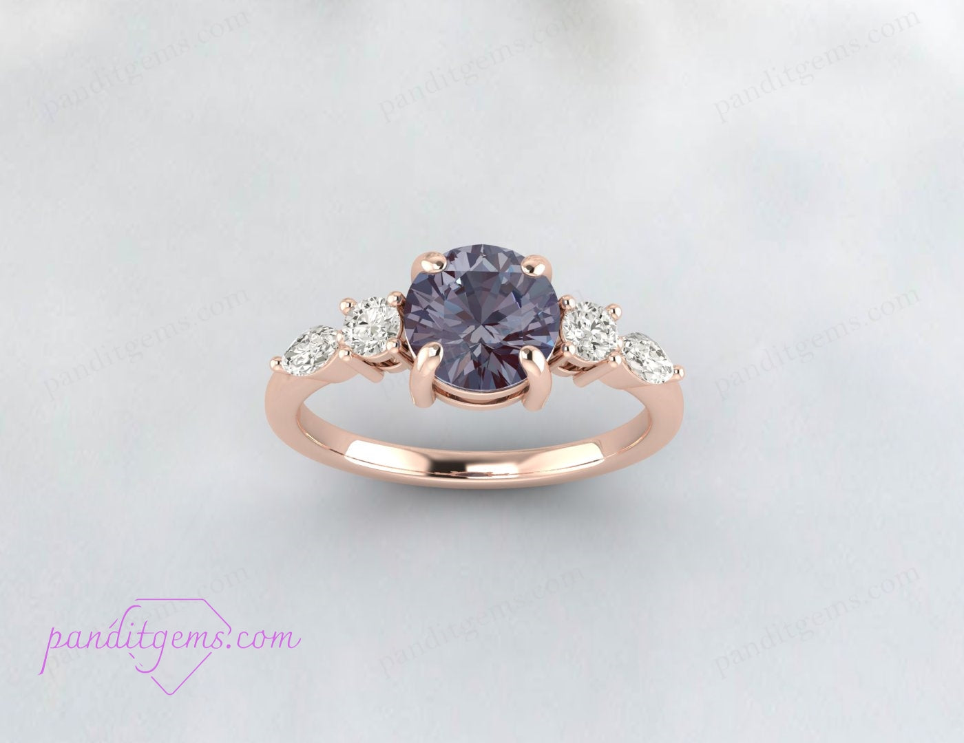 June birthstone ring with Alexandrite and diamond details.