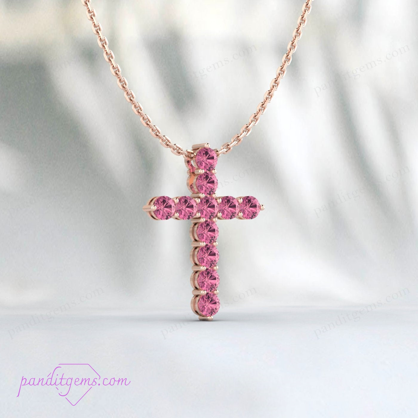 Natural Pink Tourmaline gemstone cross necklace, handcrafted in 925 sterling silver.