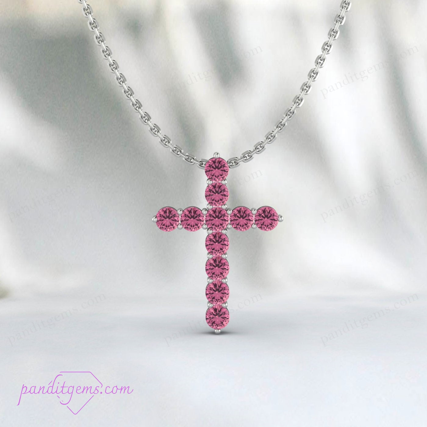 October birthstone cross pendant with Pink Tourmaline, set in sterling silver, ideal for gifts.