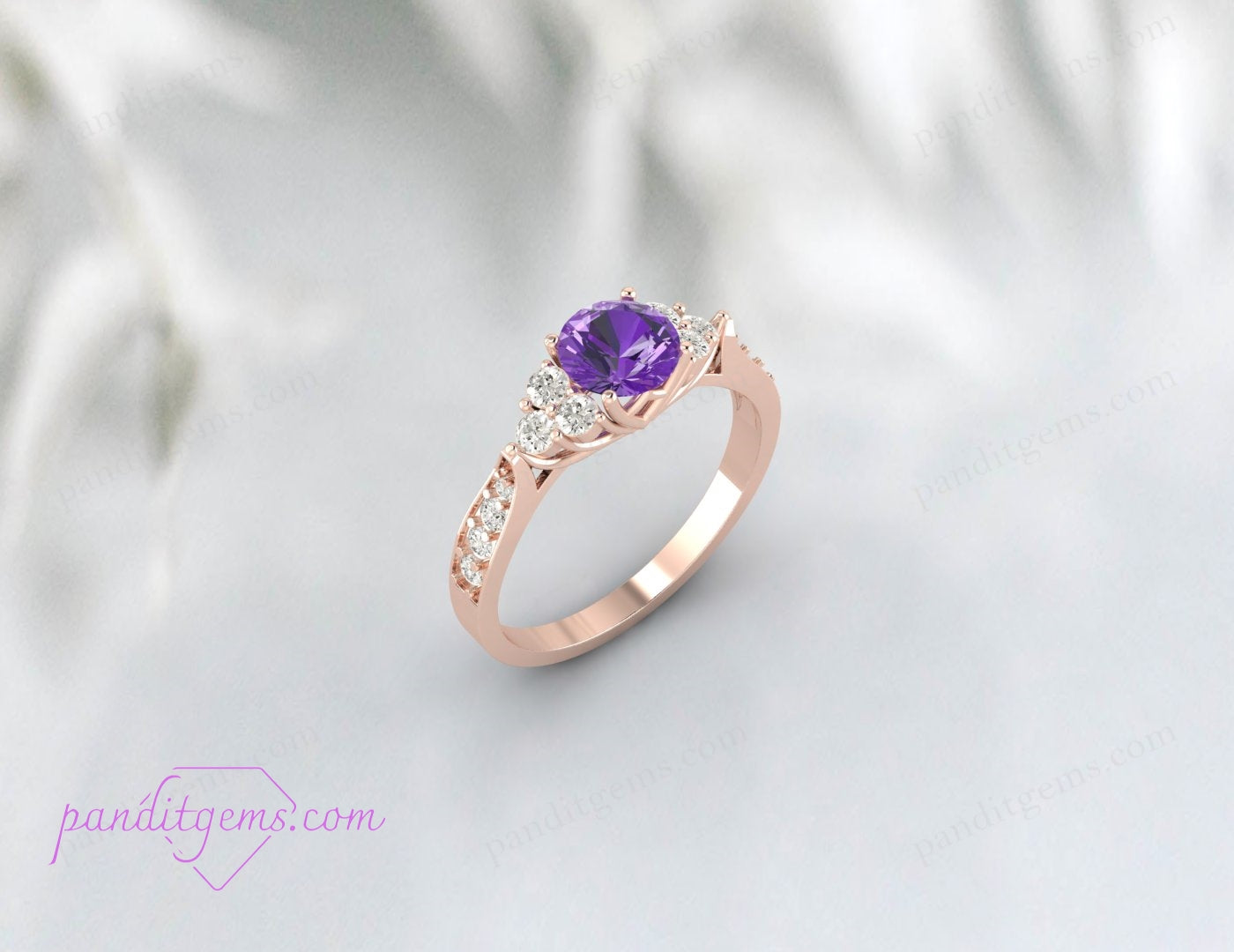 Profile view of a 14k rose gold Amethyst wedding band with a moissanite accent shank.