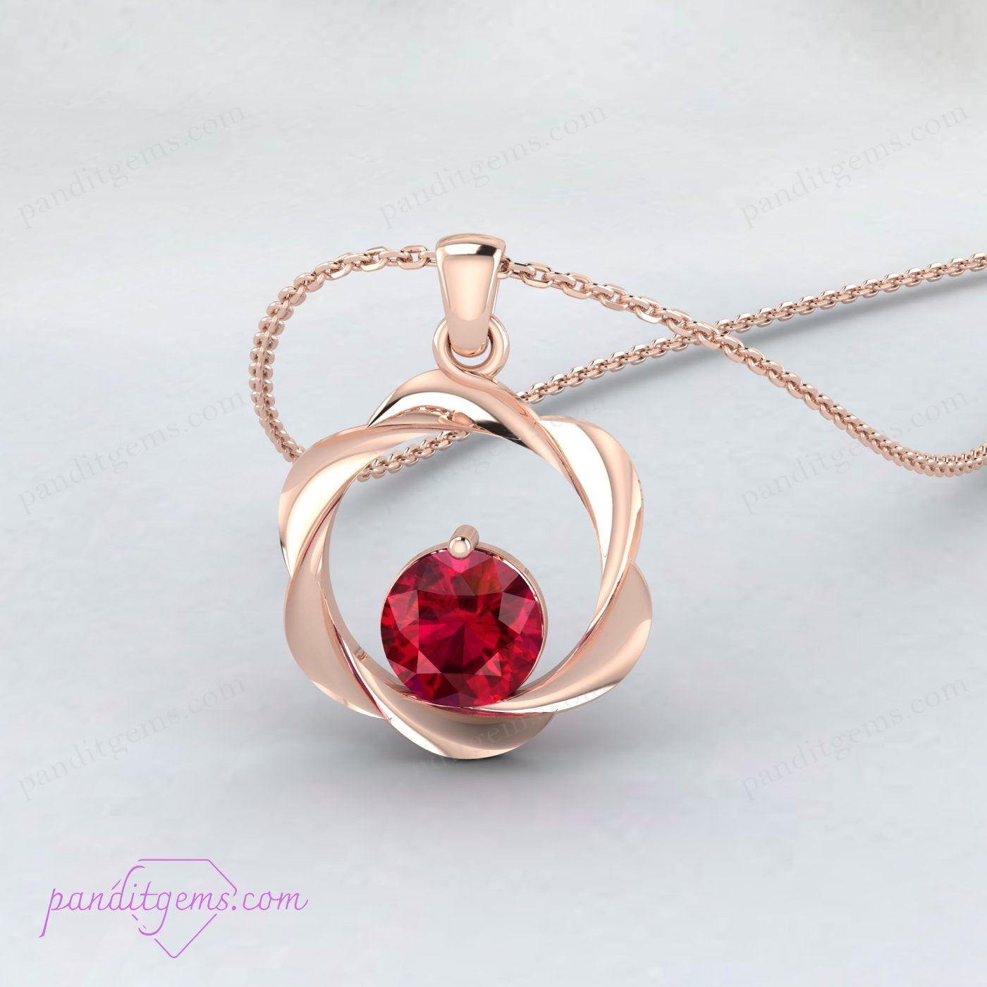 Red ruby pendant in gold-plated silver, perfect for vintage jewelry lovers.