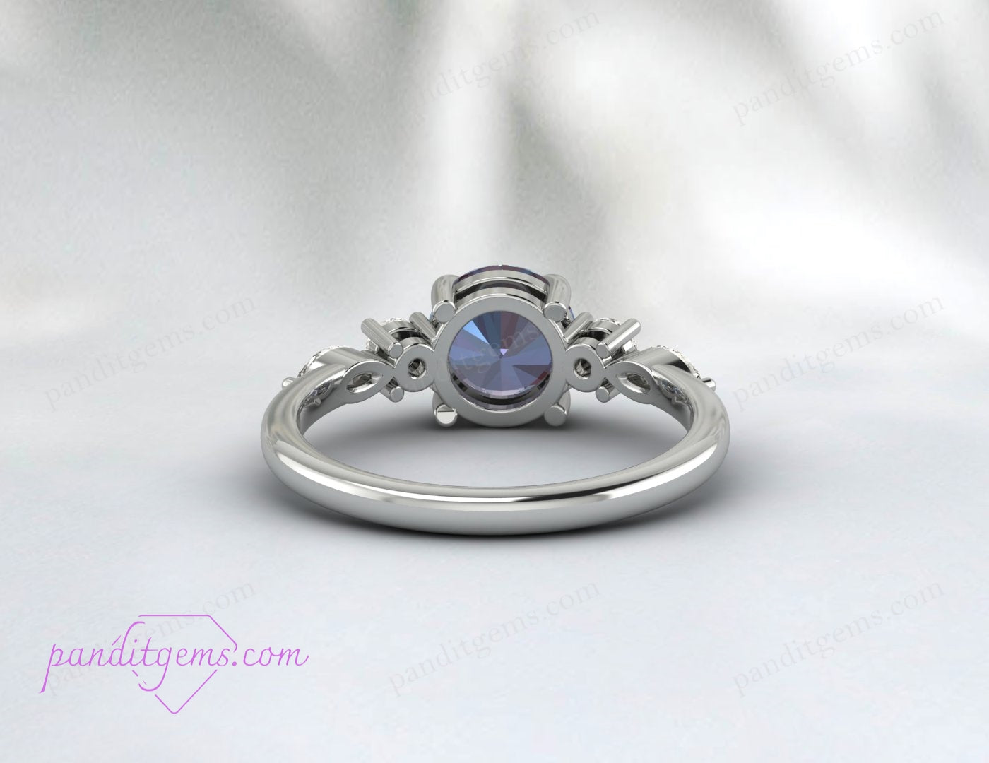 Side view of Alexandrite ring in sterling silver setting.