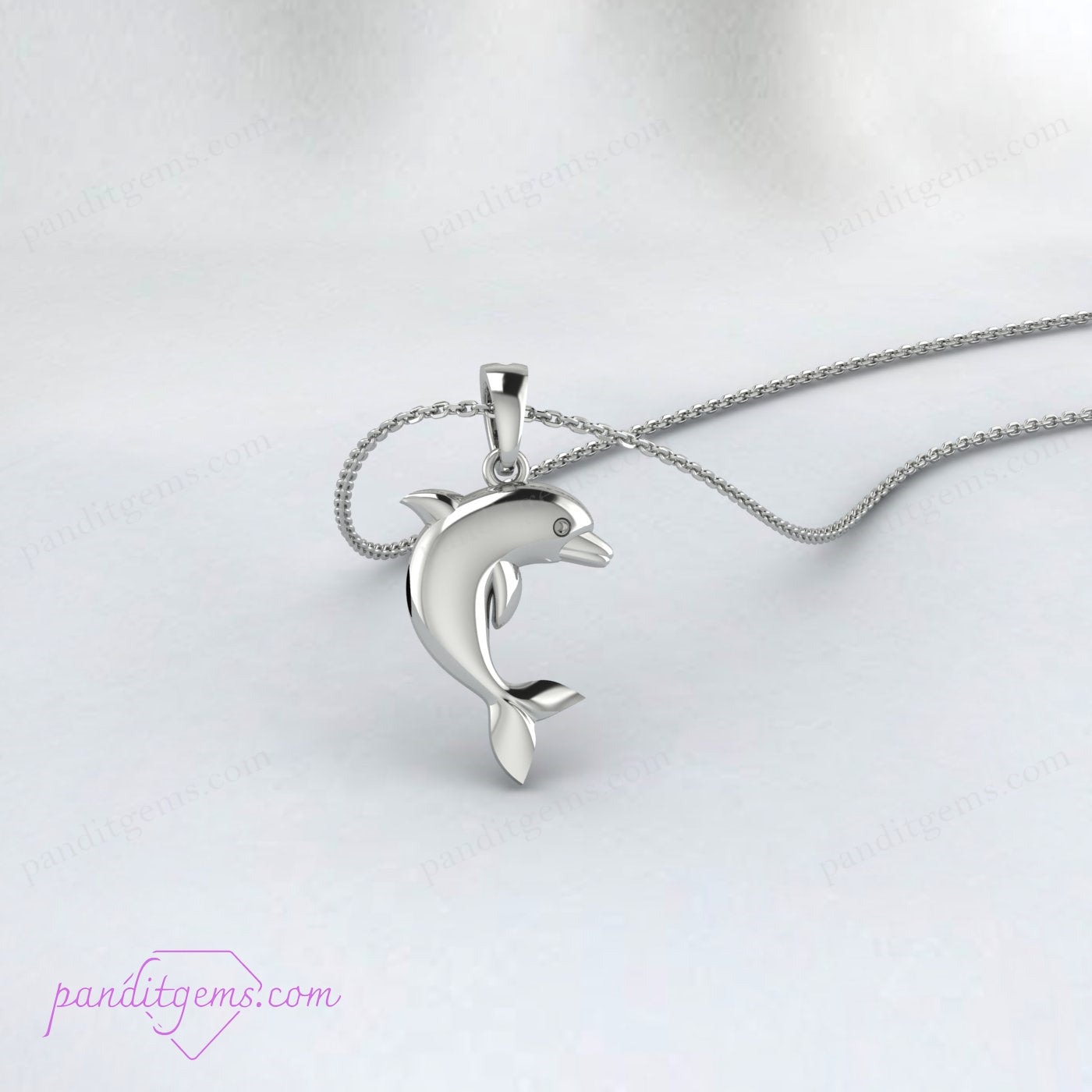 "Silver dolphin charm necklace, ocean-themed jewelry for all occasions."