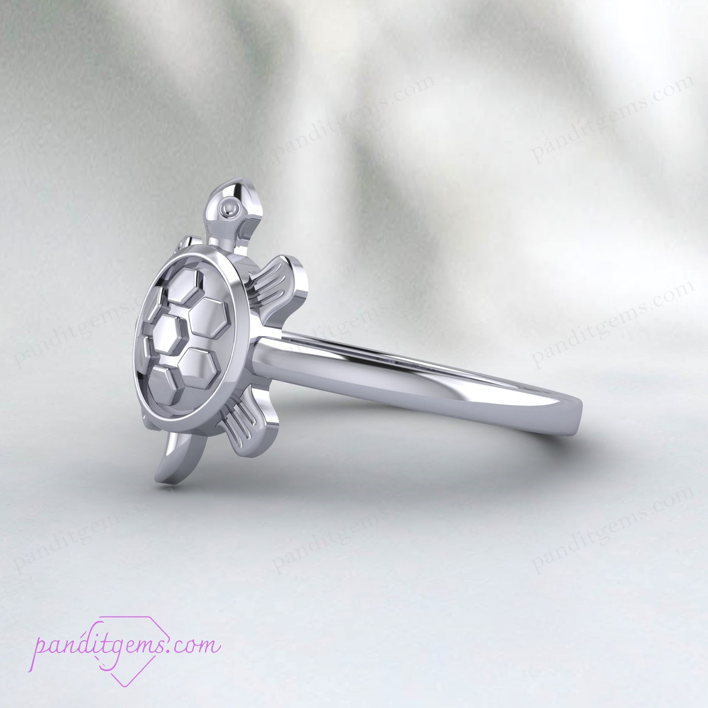 Silver turtle ring designed with Fengshui principles, offering a stylish accessory with symbolic meaning.
