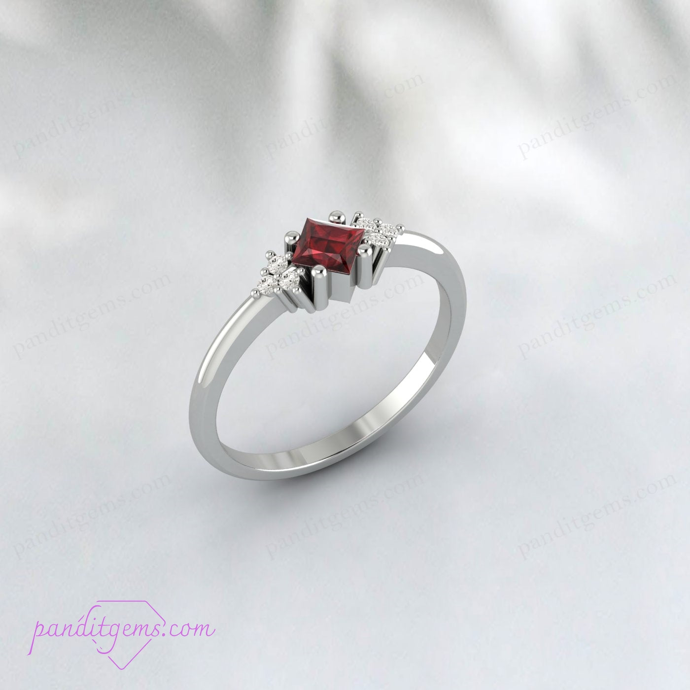 Stunning January birthstone garnet ring with diamond trio accent in 925 sterling silver.
