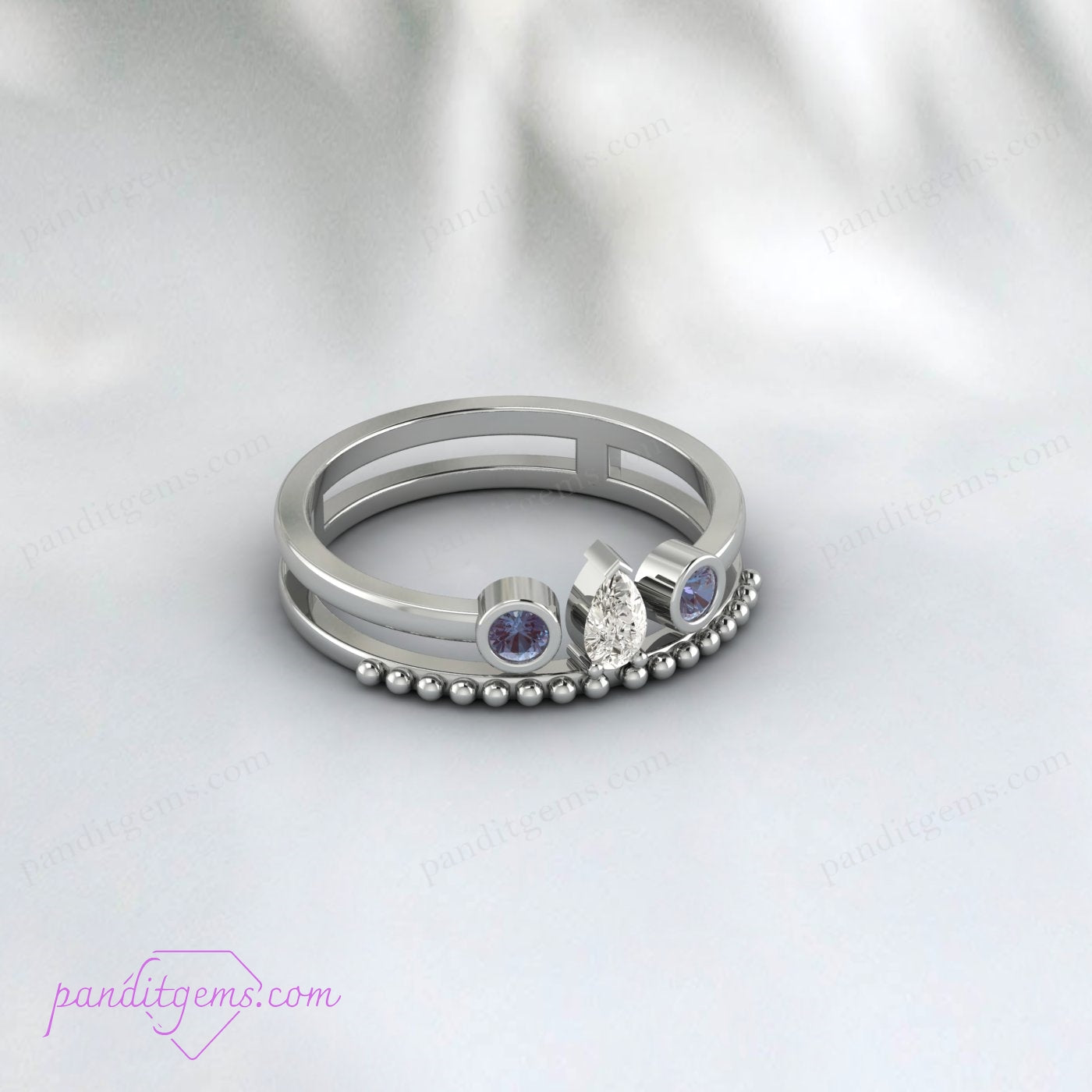 Top view of Alexandrite and Pear Diamond Ring Enhancer in 14K Yellow Gold.
