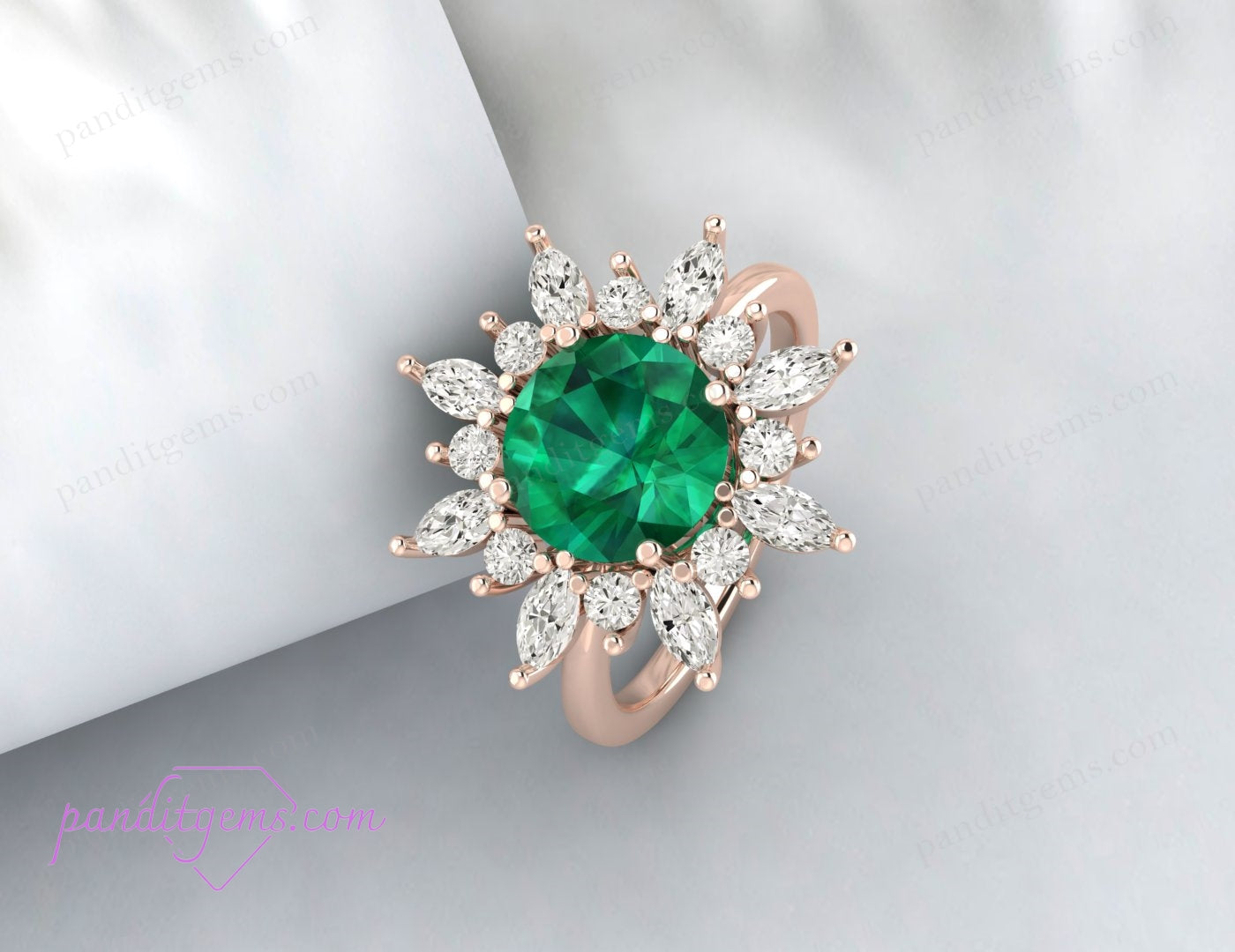 A vintage-style emerald ring with a 925 silver and 18K gold filled band.