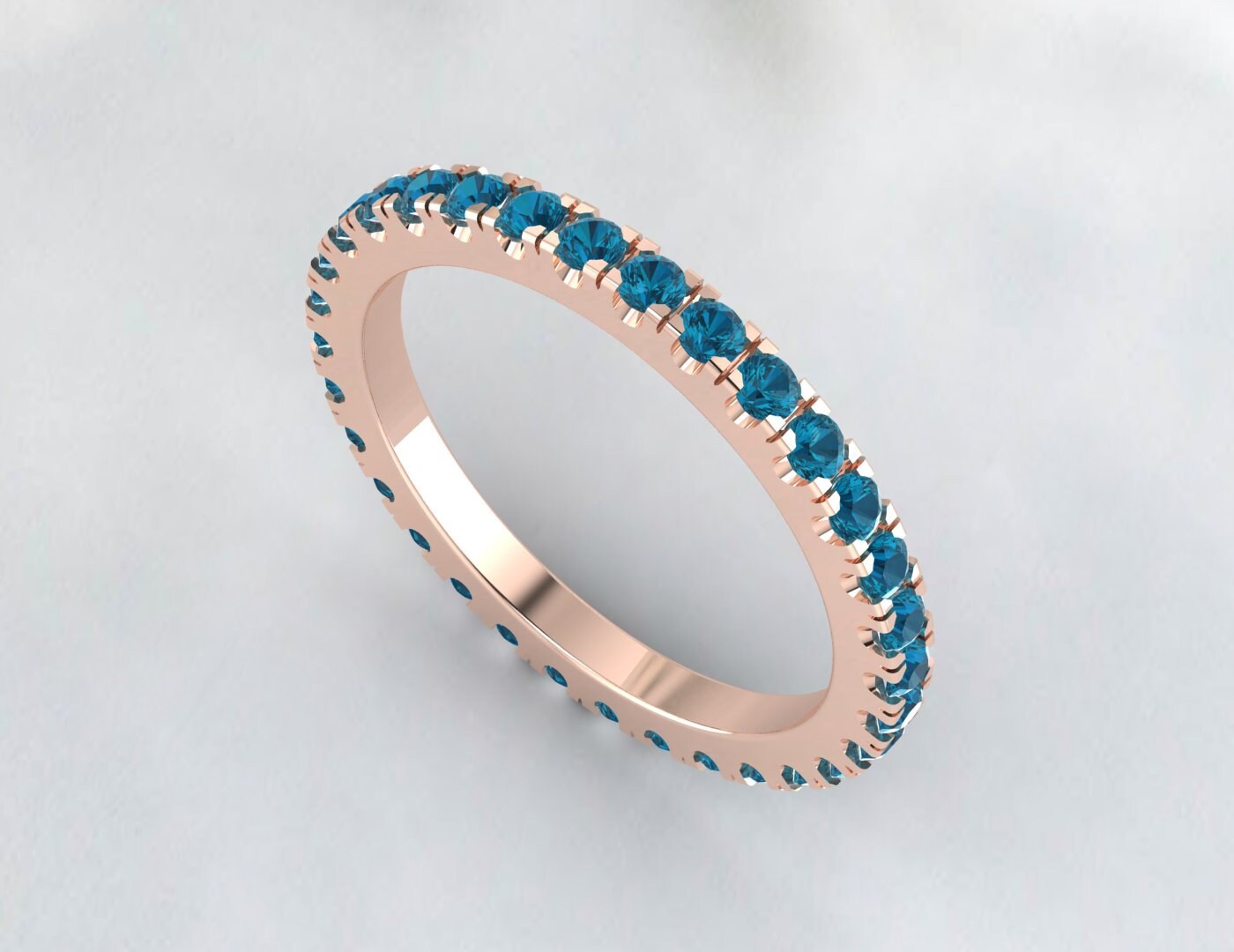 Bague de fiançailles ronde avec topaze bleue de Londres et éternité pour elle