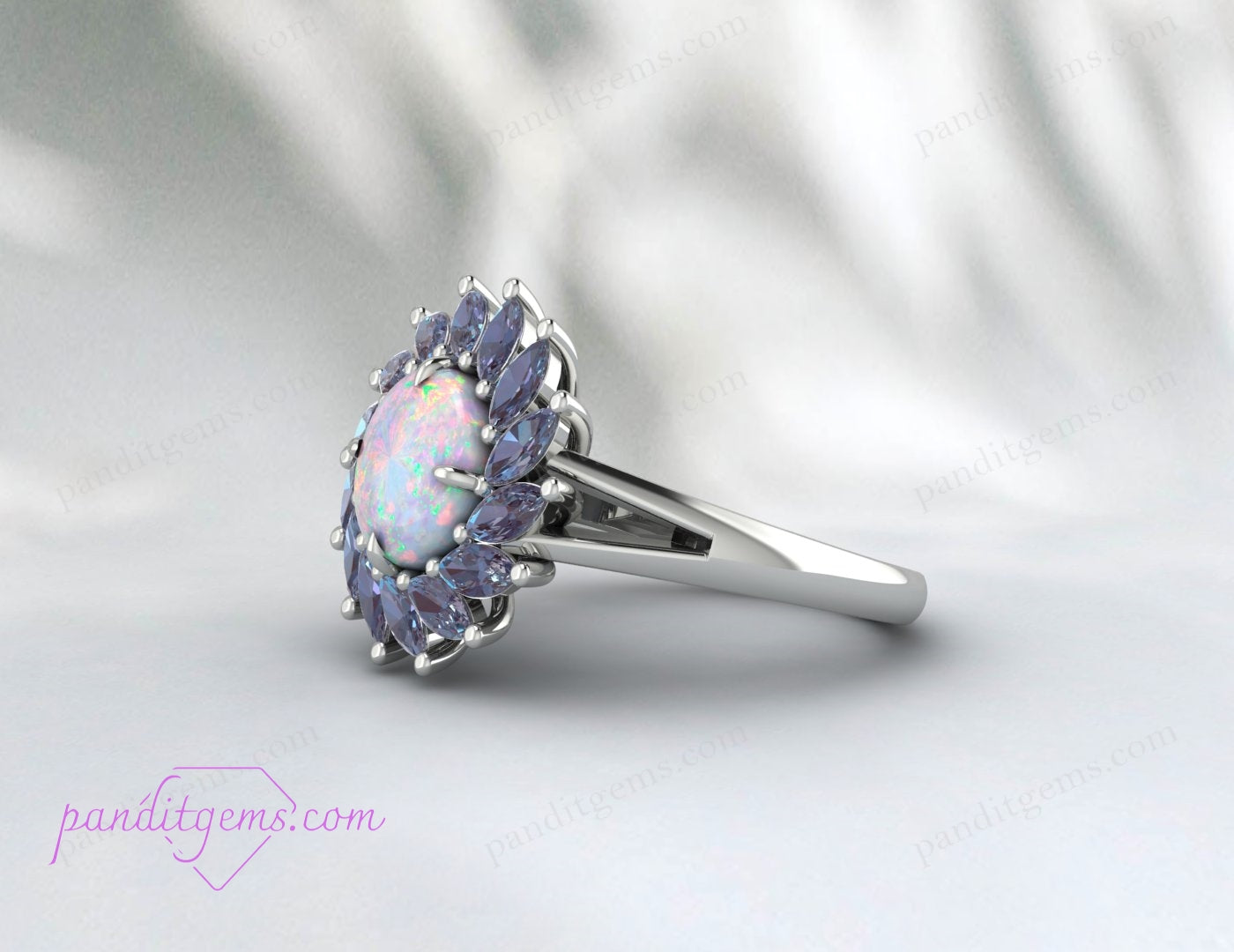 A delicate and vintage-inspired Alexandrite and Opal engagement ring for October birthdays.