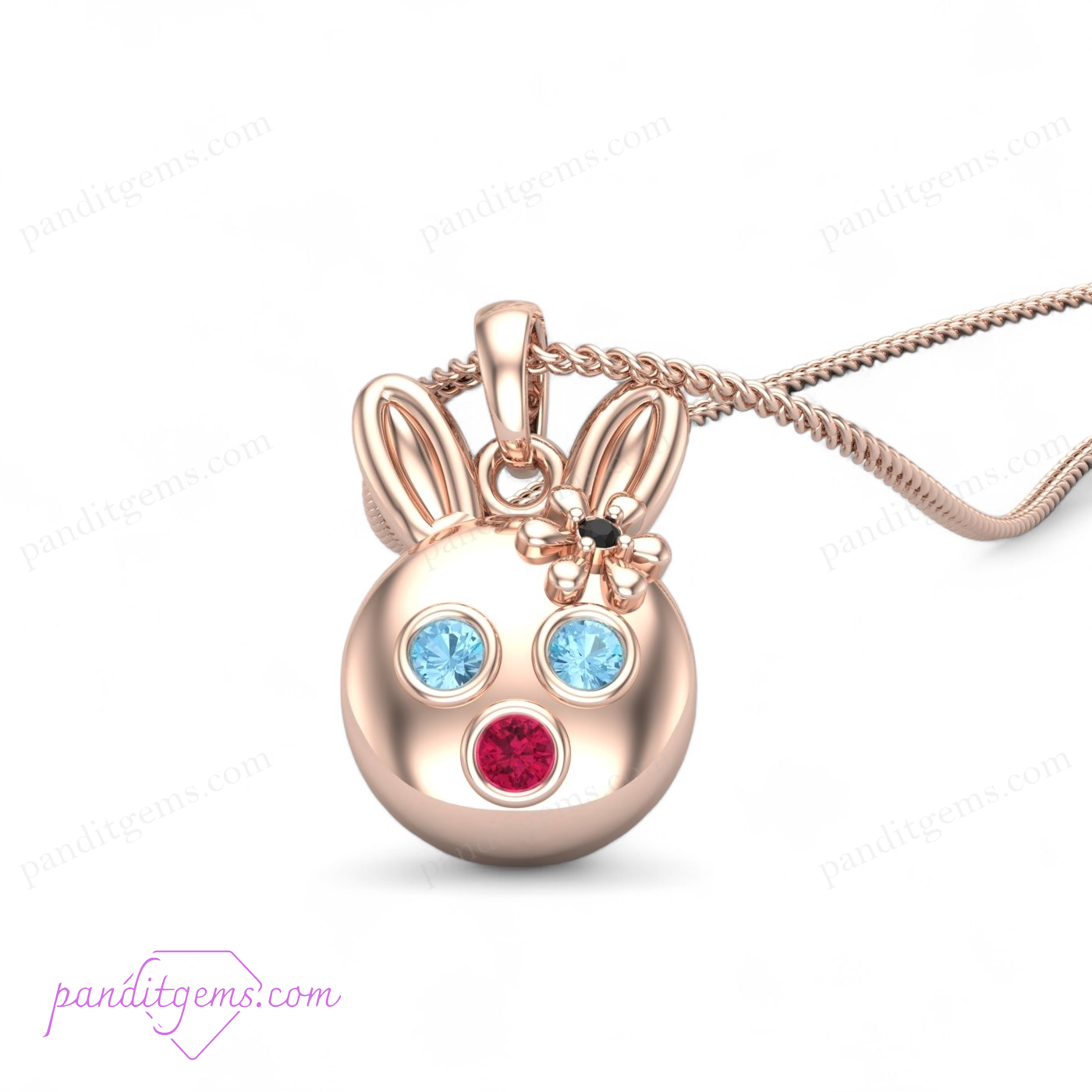 Aquamarine, Ruby, and Onyx Bunny Necklace in sterling silver with 14k gold accents, featuring a handcrafted rabbit pendant.