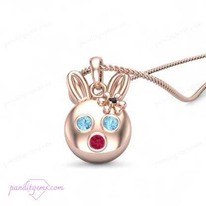 Aquamarine, Ruby, and Onyx Bunny Necklace in sterling silver with 14k gold accents, featuring a handcrafted rabbit pendant.