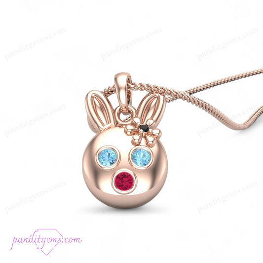 Aquamarine, Ruby, and Onyx Bunny Necklace in sterling silver with 14k gold accents, featuring a handcrafted rabbit pendant.