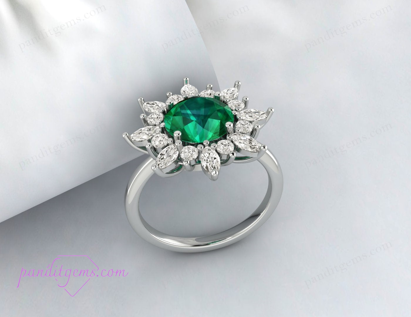 An art deco style emerald ring with a vintage charm.