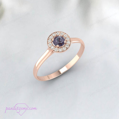 Art Deco ring in rose gold with a central Alexandrite gemstone.