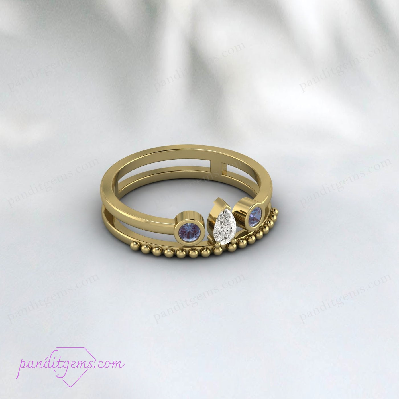 Bridal Engagement Ring Set with Alexandrite and Pear Diamond in Yellow Gold.
