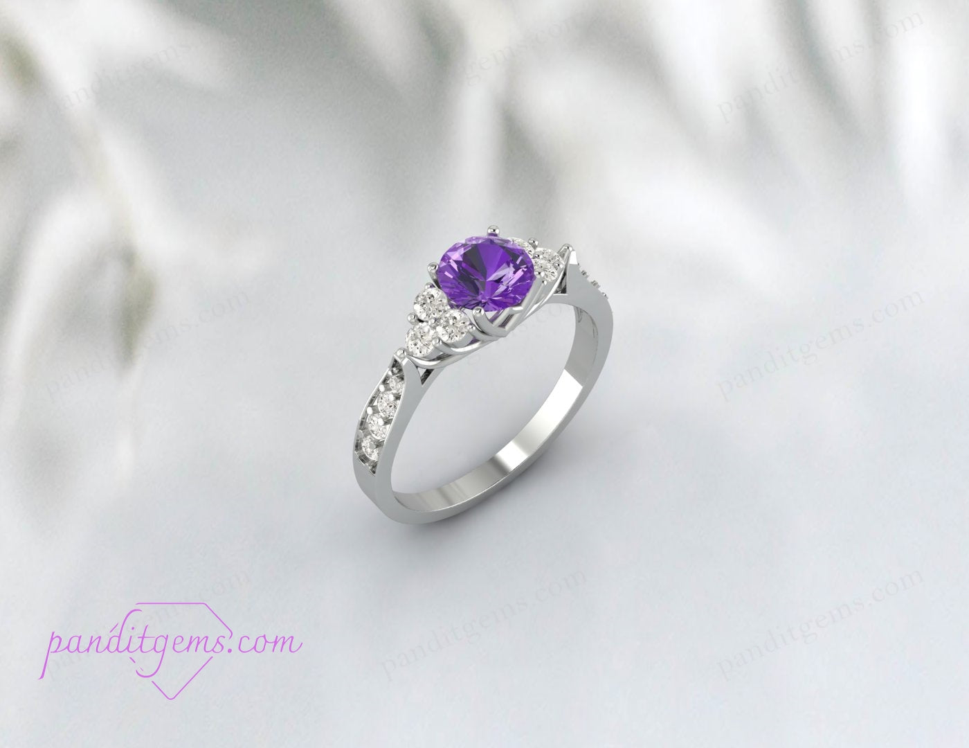 Classic engagement ring with a pear-shaped amethyst gemstone and moissanite accent.
