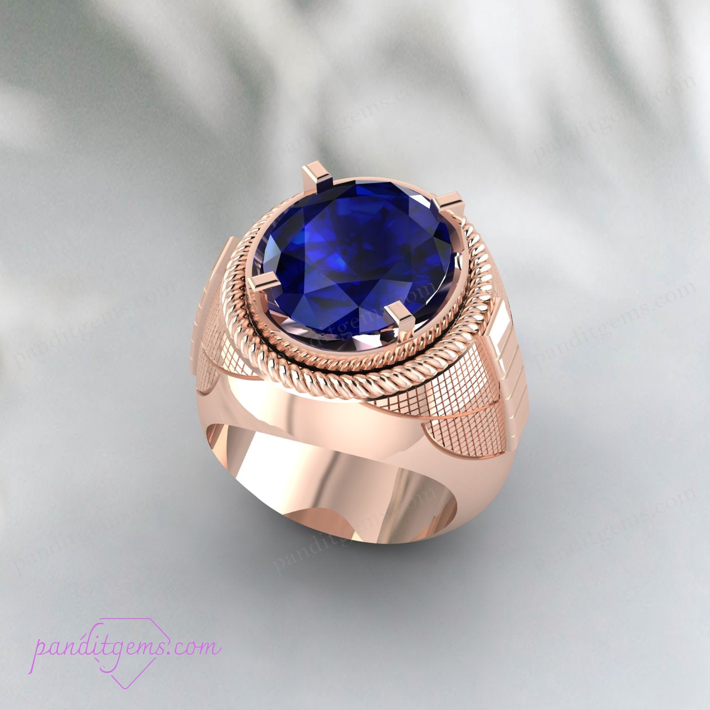 Close-up of 925 Sterling Silver Men's Ring with a polished oval sapphire centerpiece.