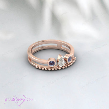 Close-up of Pear Diamond with Natural Alexandrite Gemstone in Open Band Design.