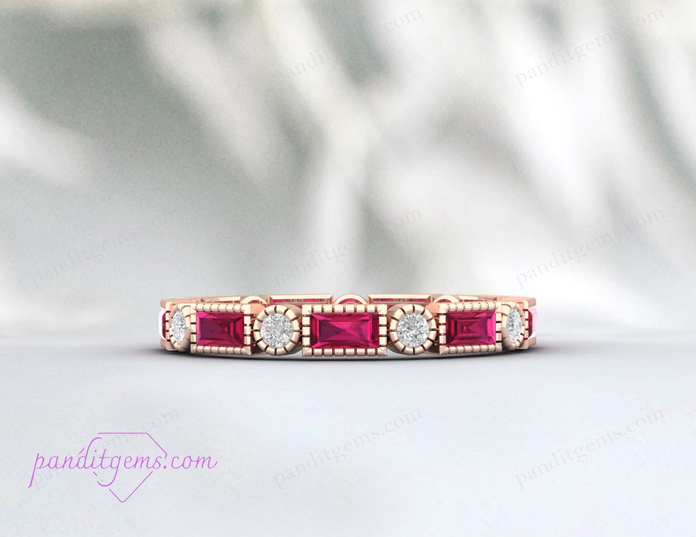 Close-up of a full eternity wedding band with baguette-cut rubies and CZ diamonds set in sterling silver.