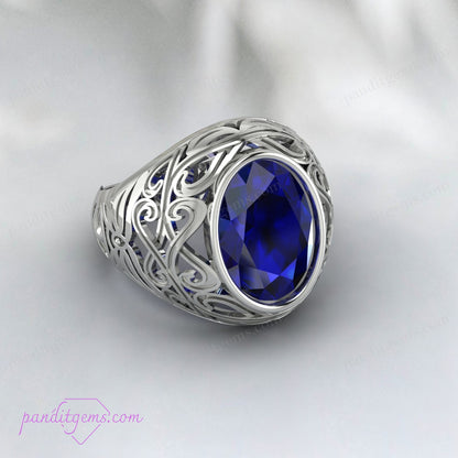 Close-up of the Blue Sapphire Solitaire Ring featuring a 10x14mm oval cut gemstone set in a detailed 925 sterling silver band.