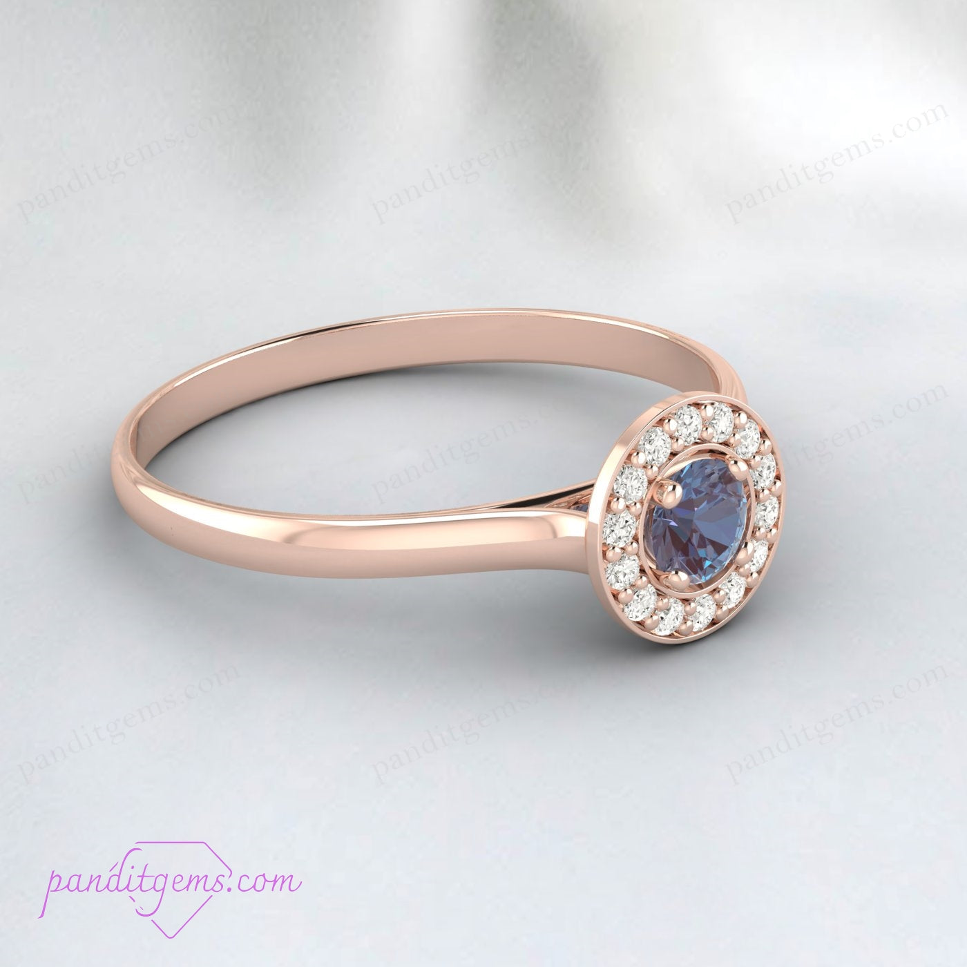 Engagement ring featuring a color-changing Alexandrite gemstone.