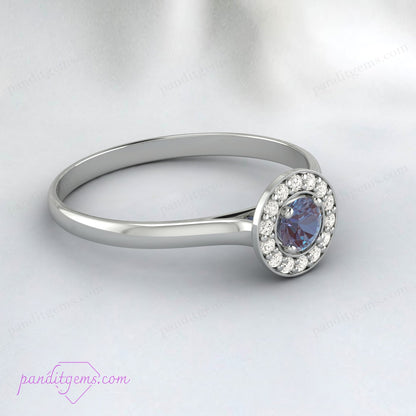 Dainty Alexandrite engagement ring crafted in rose gold.