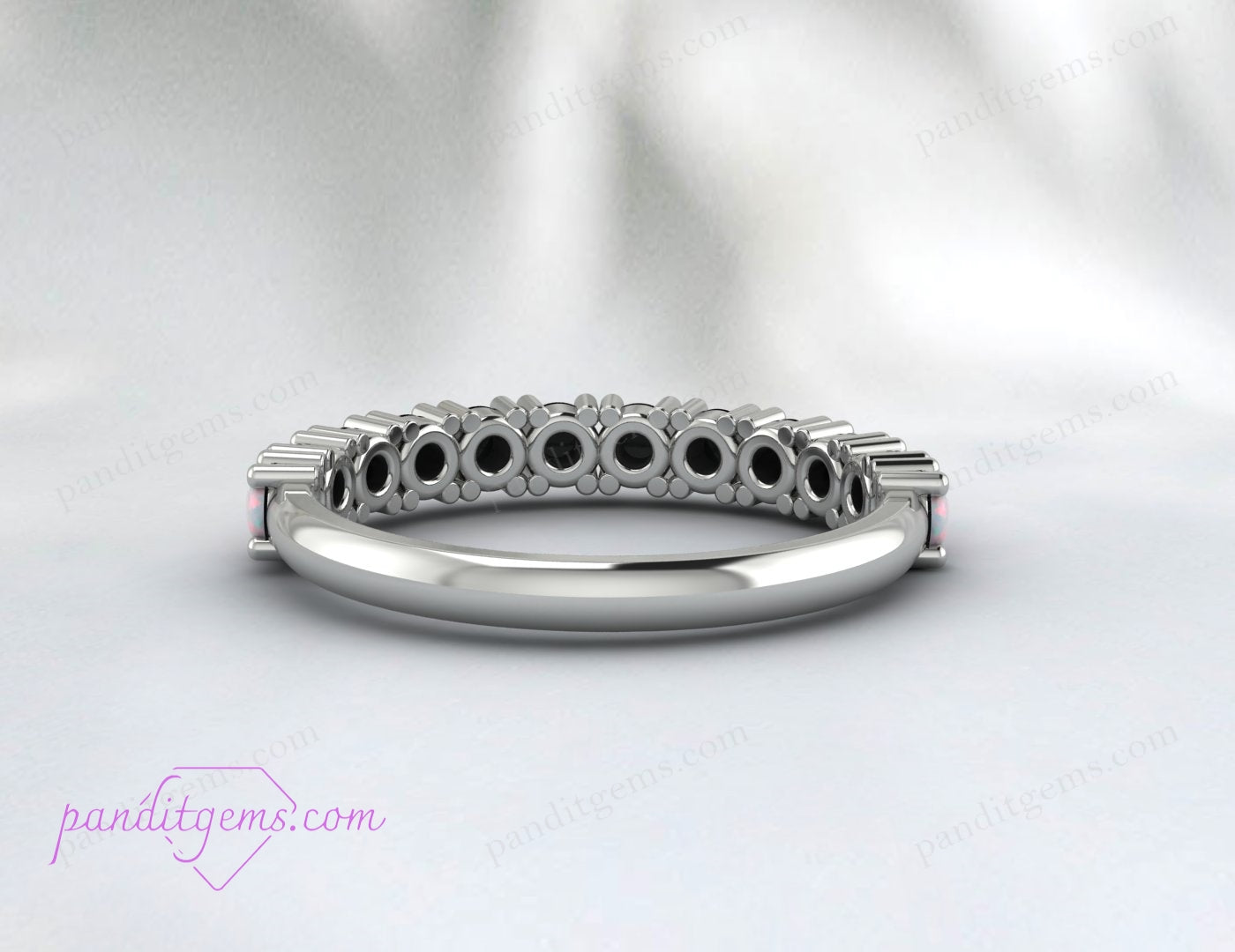 Dainty rose gold opal ring, crafted as a bridal band or engagement gift.
