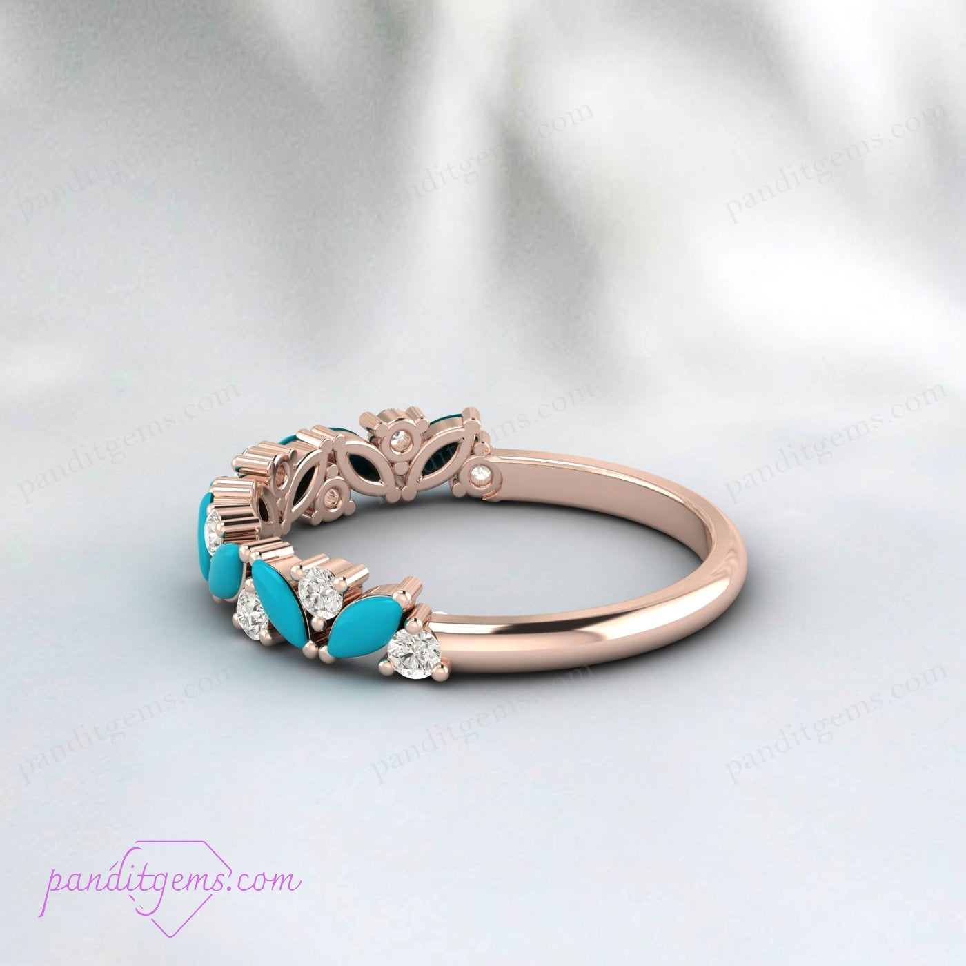 A designer turquoise ring for women, featuring a blue stone and white diamond accents.