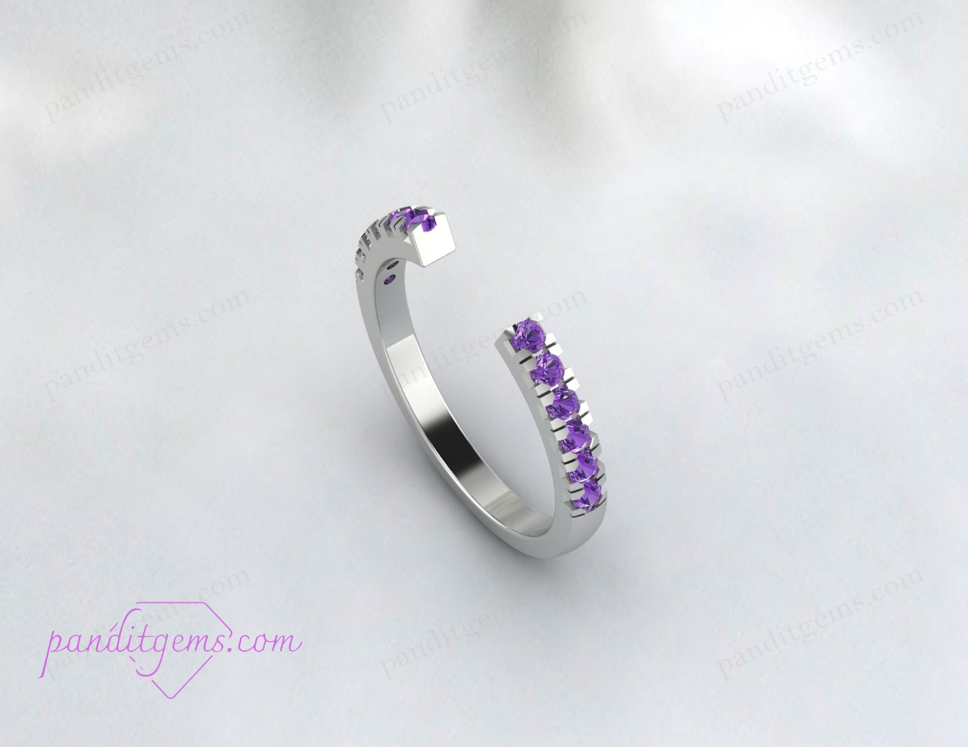 Detailed shot of open gap amethyst and alexandrite ring in sterling silver.