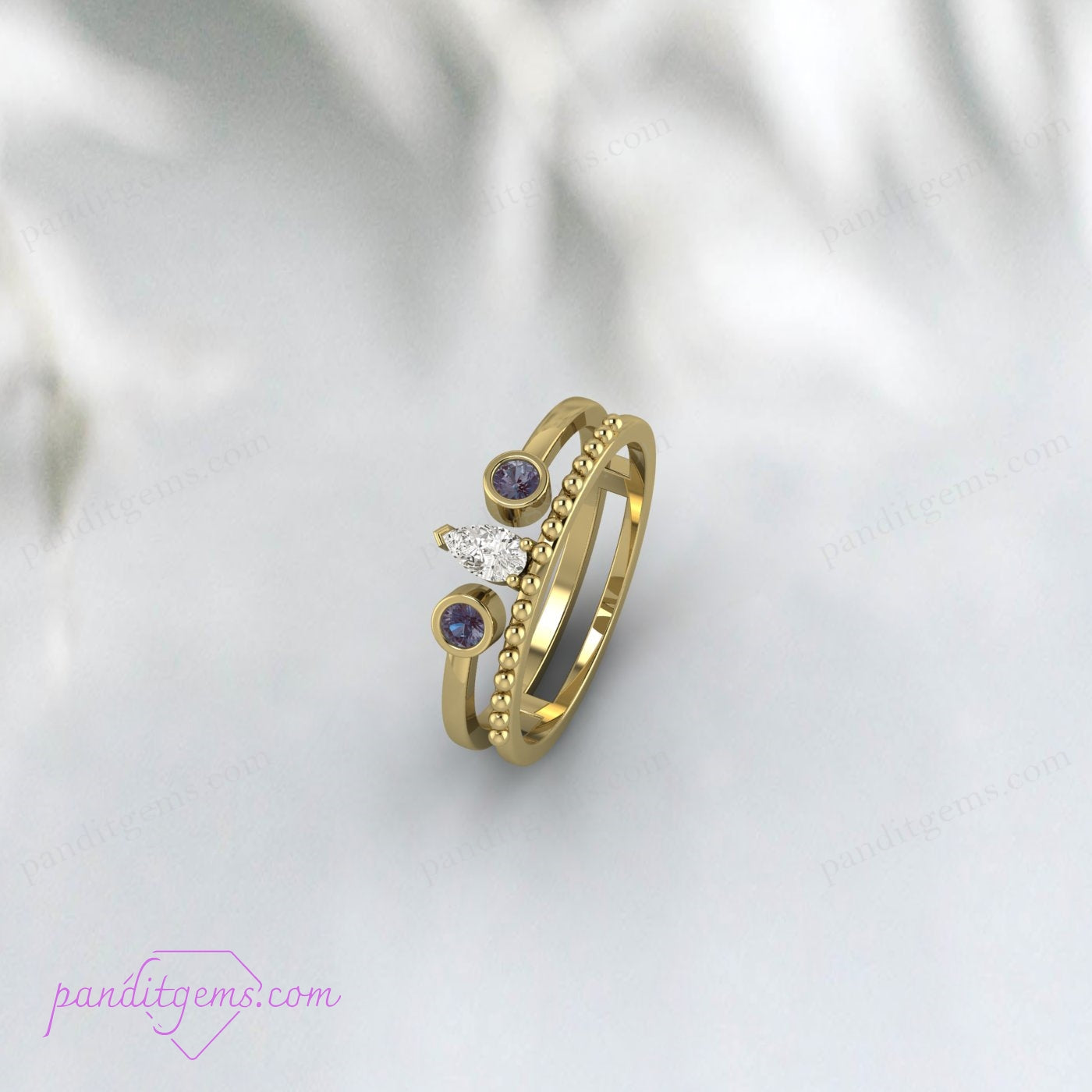 Detailed view of Alexandrite Gemstone in Open Band Bridal Ring Enhancer.