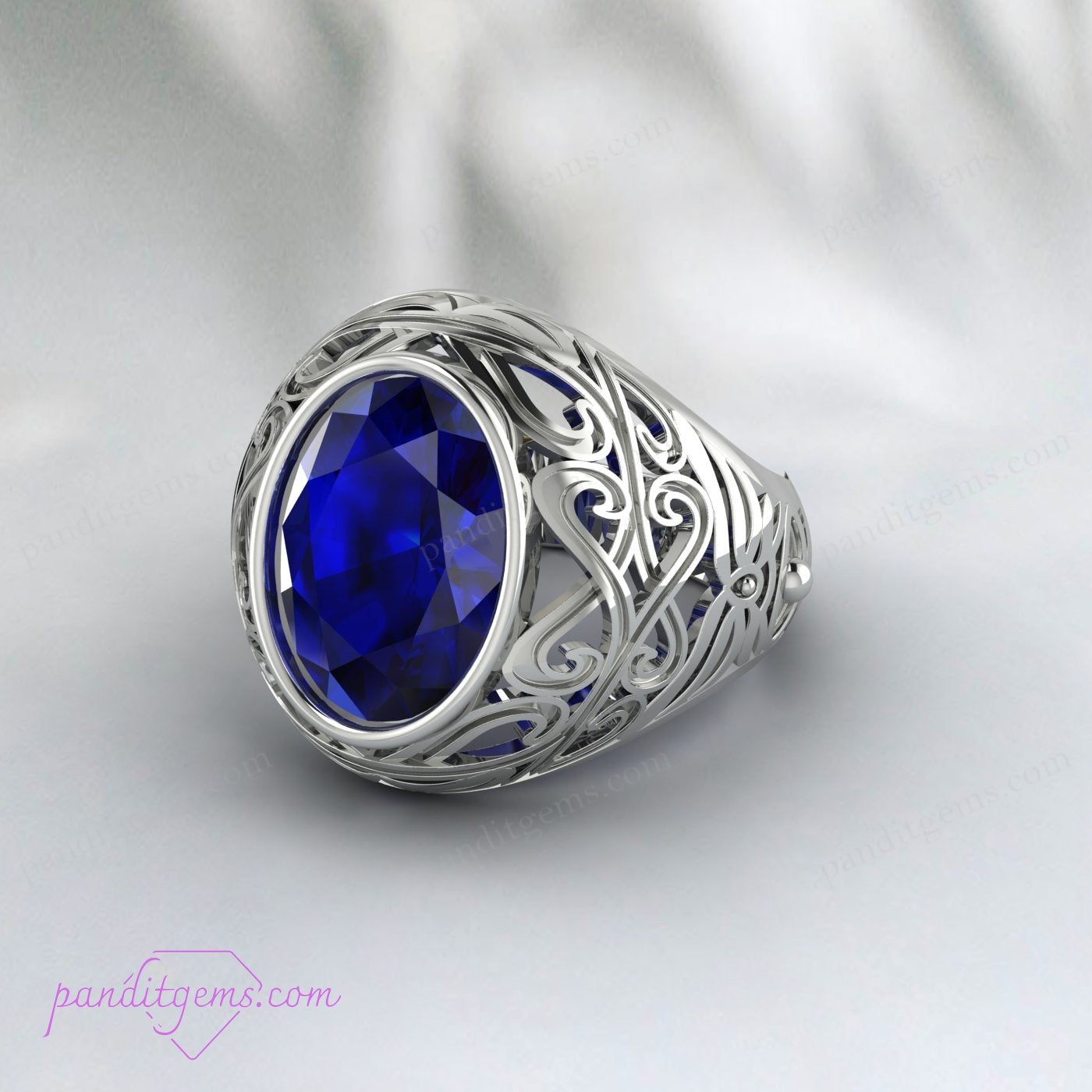 Detailed view of the Vintage Ceylon Blue Sapphire Ring, showcasing the art deco filigree pattern and large blue sapphire.