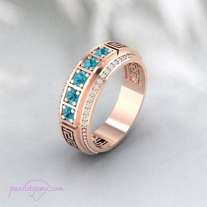Elegant Greek Key Pattern Blue Topaz Ring on Woman’s Hand