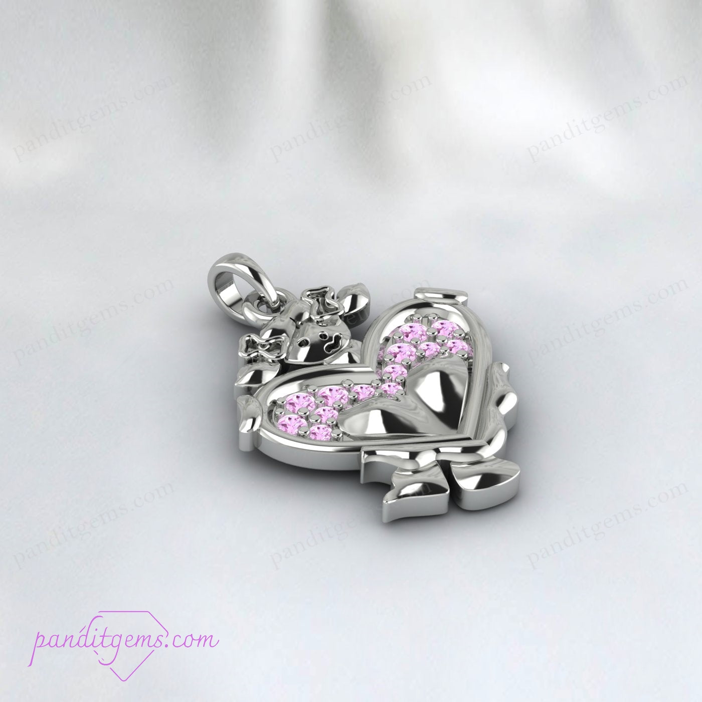 The pink sapphire heart pendant necklace styled elegantly.