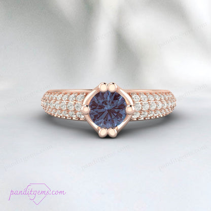Elegant bridal ring featuring a round Alexandrite gemstone with diamond accents.