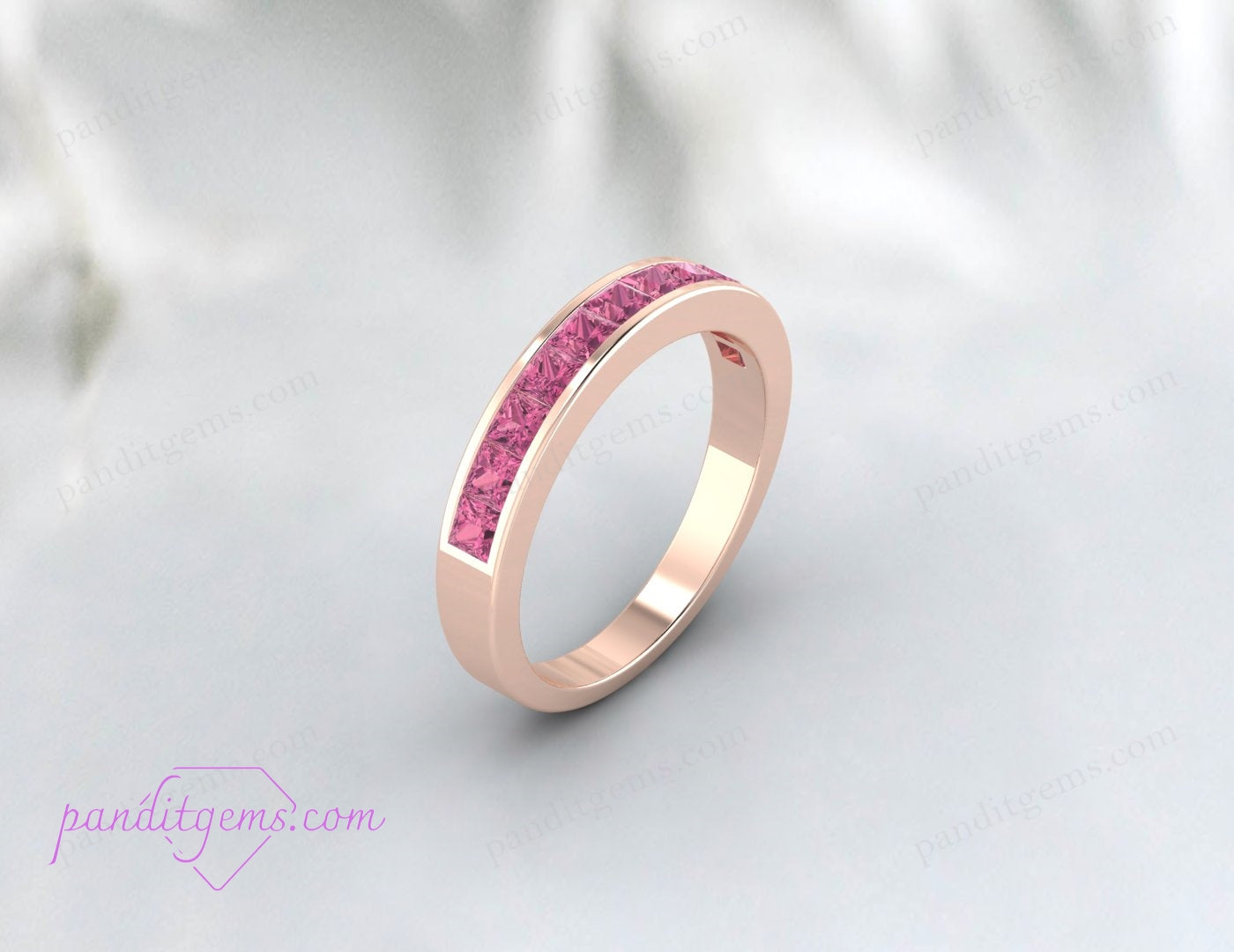 Elegant pink tourmaline bridal band in solid 14K gold.
