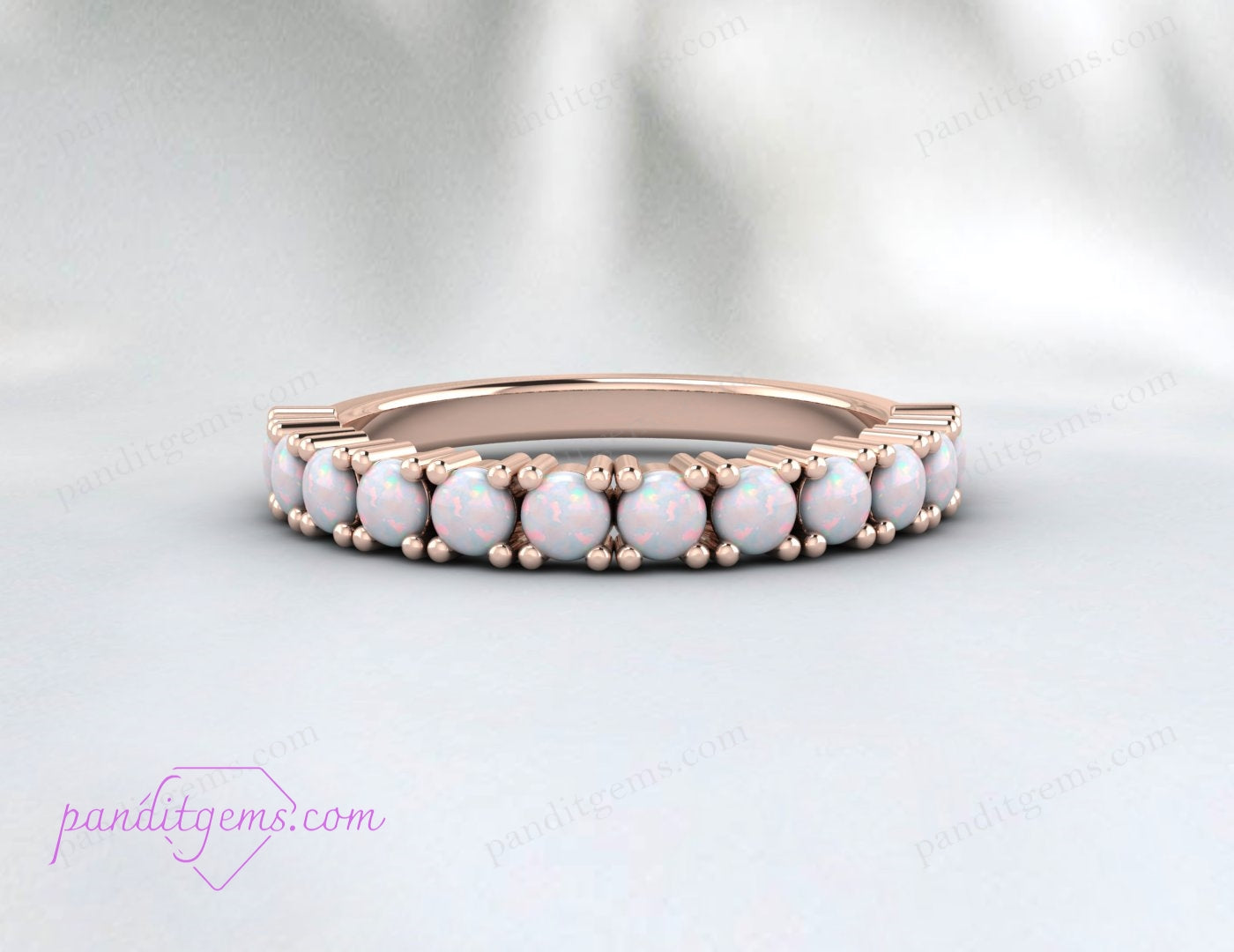 Elegant sterling silver opal promise ring, perfect for bridal and anniversary gifts.

