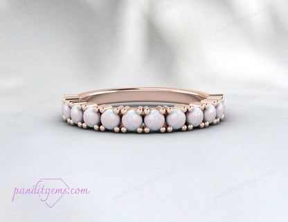 Elegant sterling silver opal promise ring, perfect for bridal and anniversary gifts.
