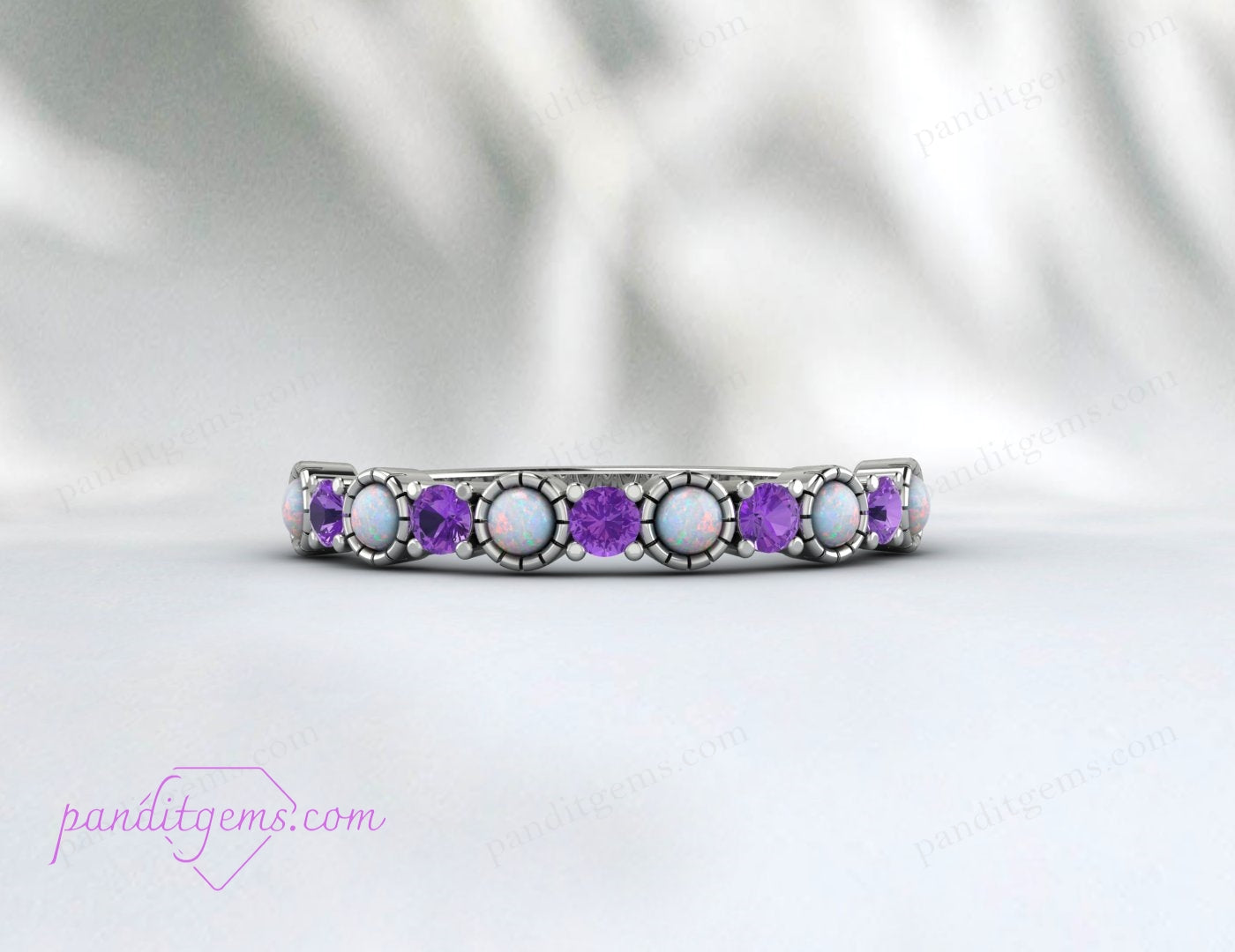 "Elegant wedding band with fire opal and amethyst gemstones set in white gold, ideal for anniversaries."